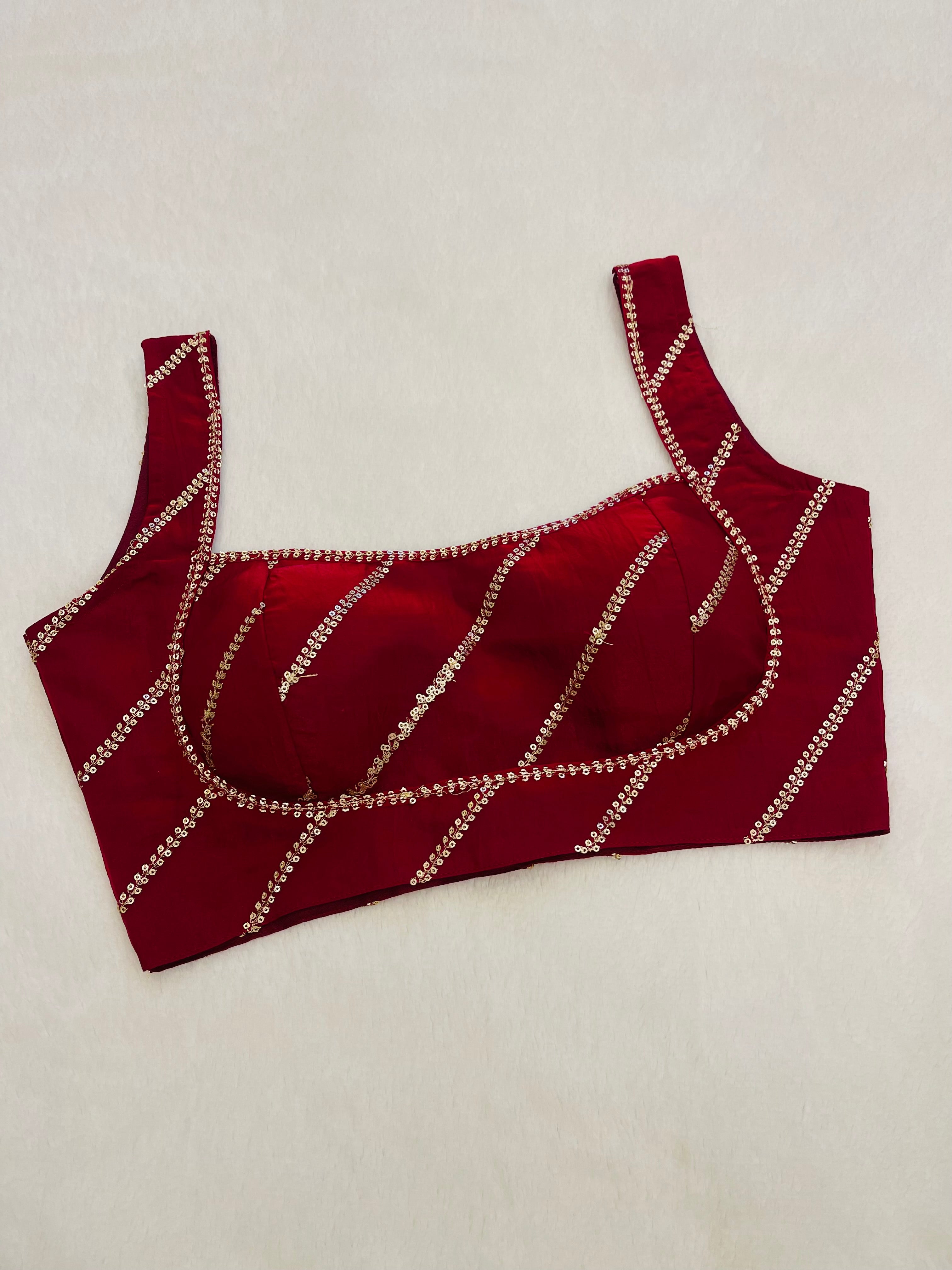 Divine maroon sleeveless blouse