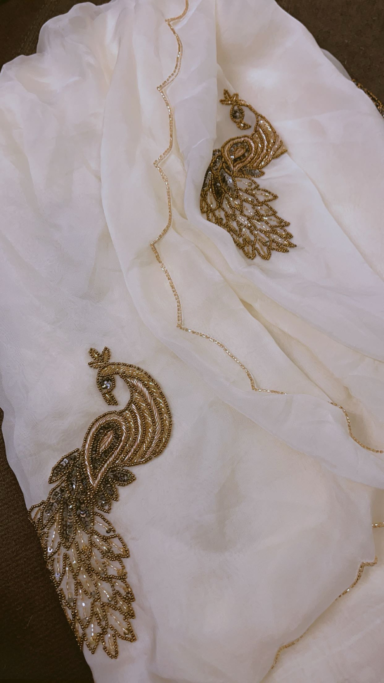 Off-White Hand-Embroidered Organza Saree with Golden Peacock Motifs