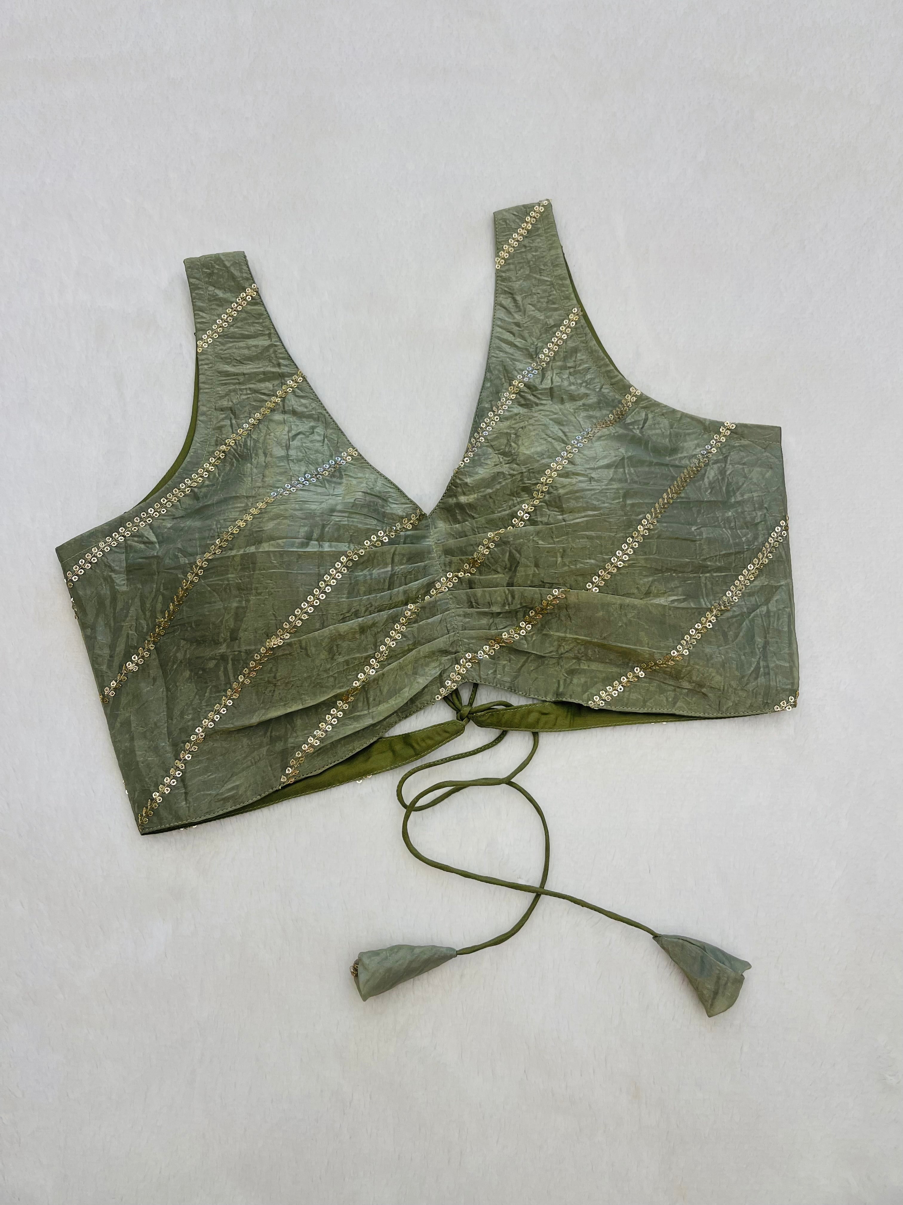 Divine light green organza festive wear backless blouse