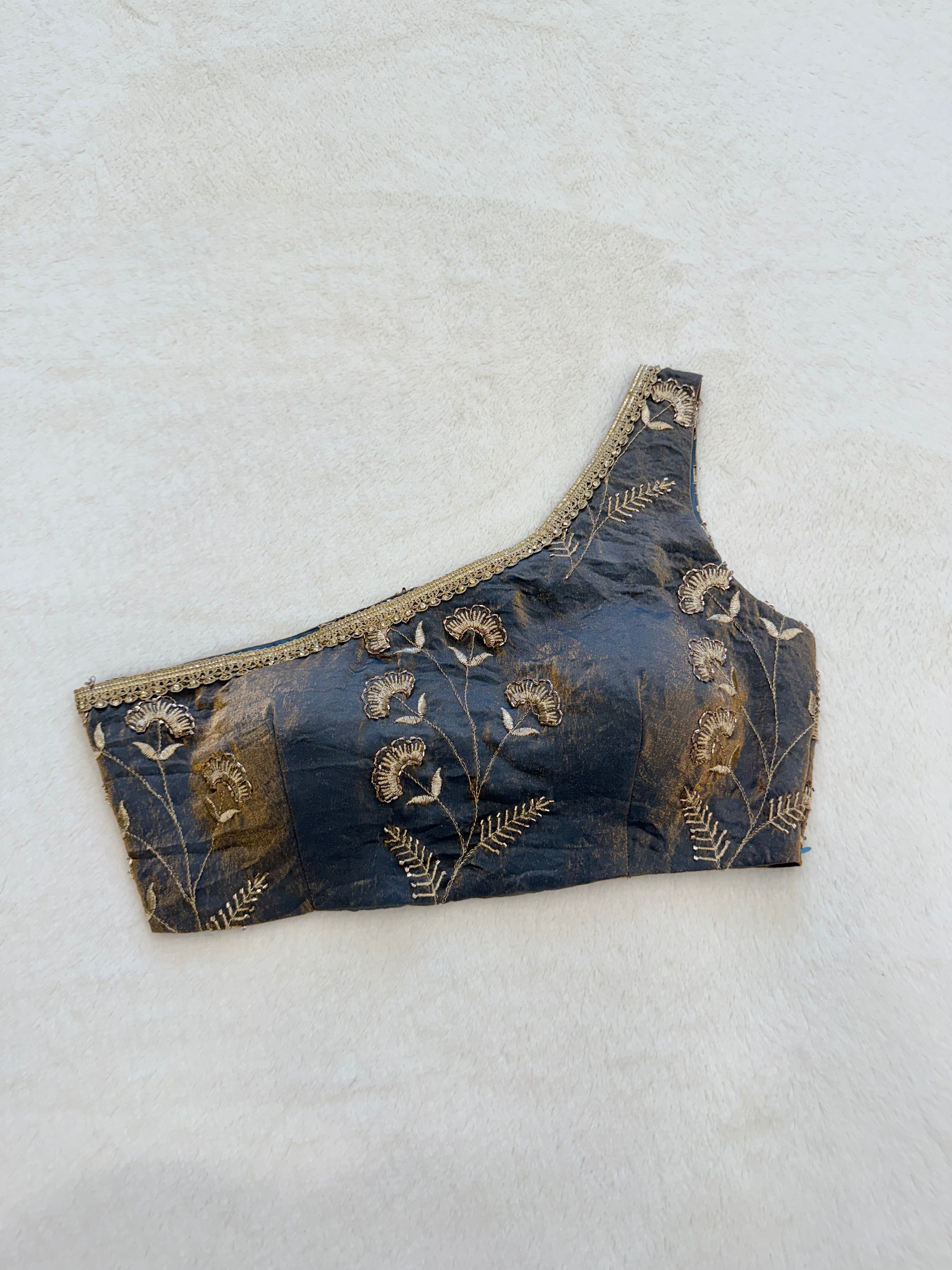 Fully stitched organza blouse with intricate embroidery