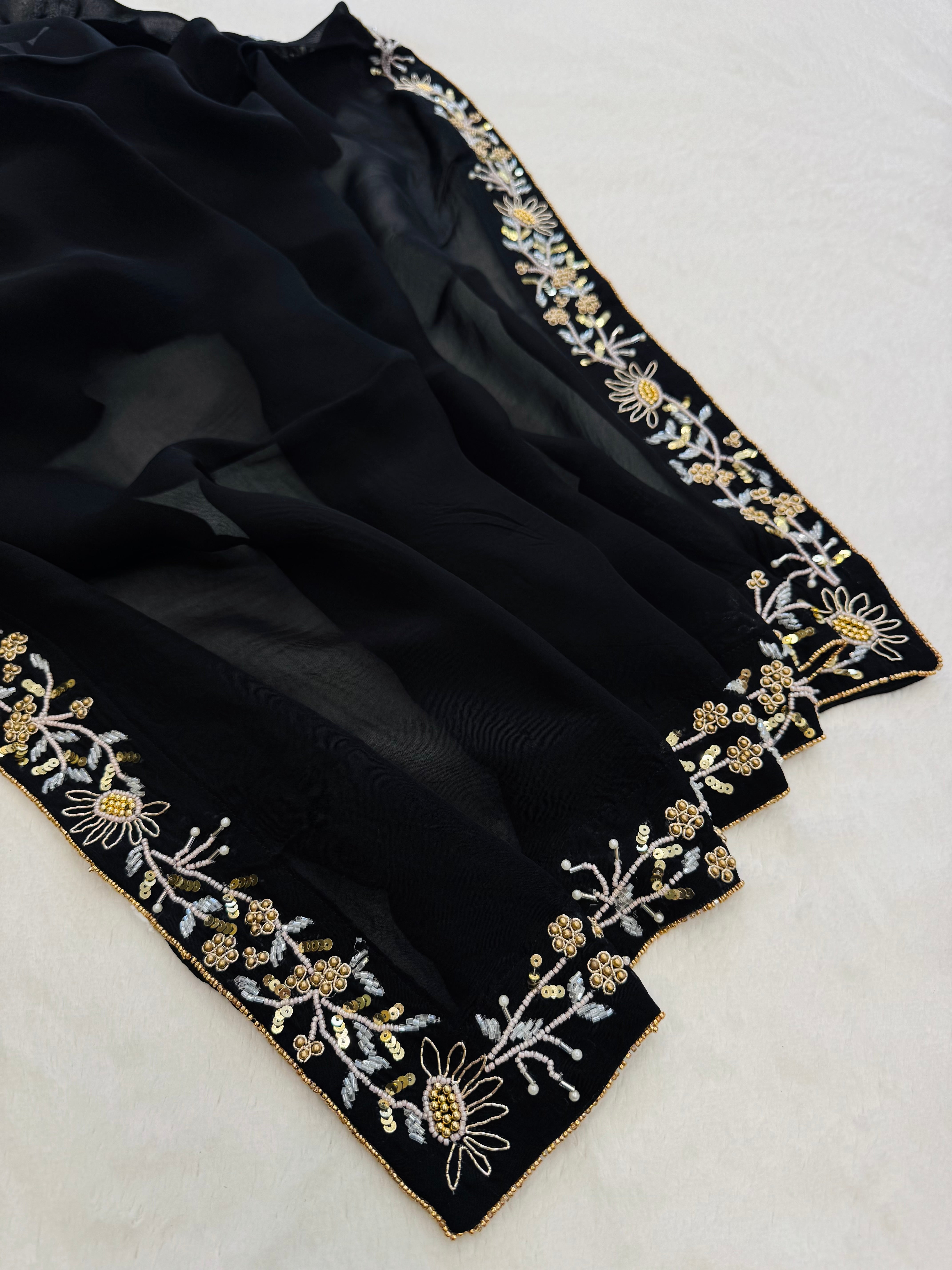 Organza saree with black blouse piece – lightweight elegant drape