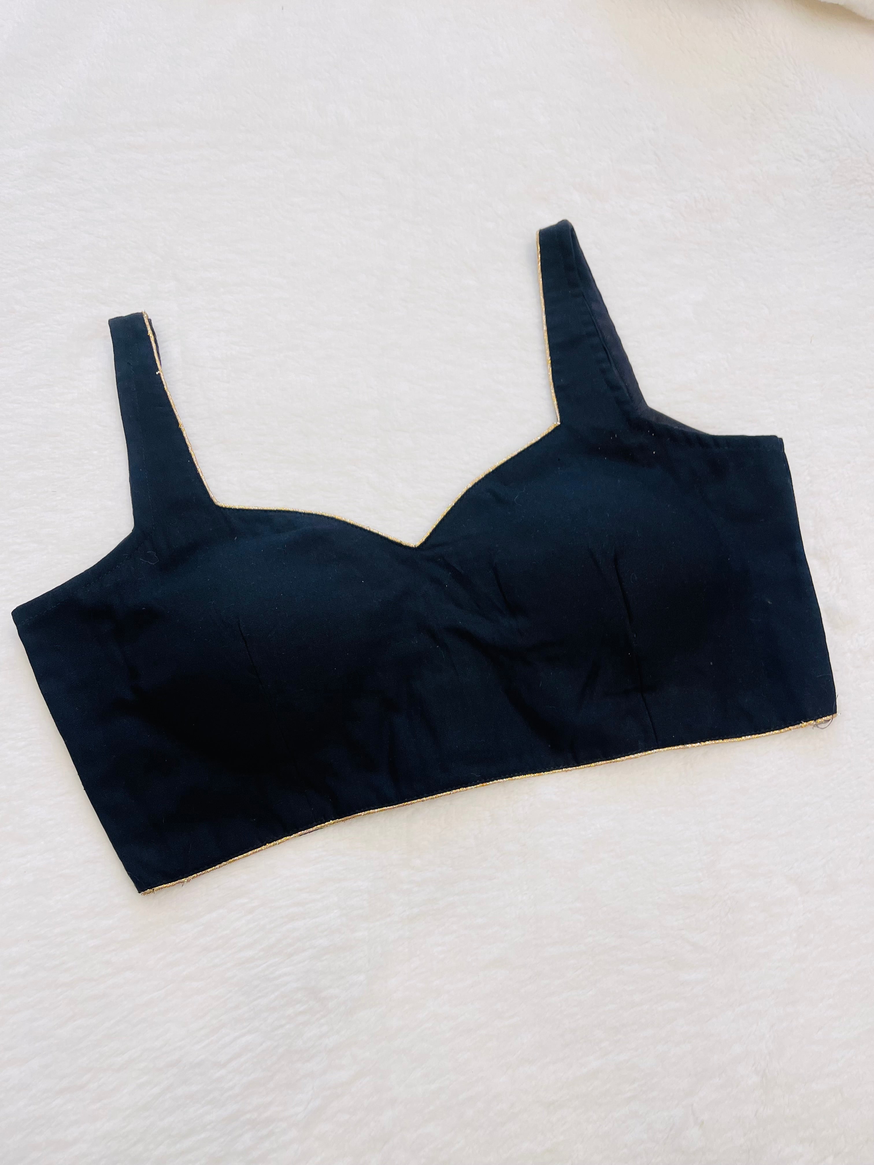 Black rayon sleeveless padded V-neck fully stitched blouse