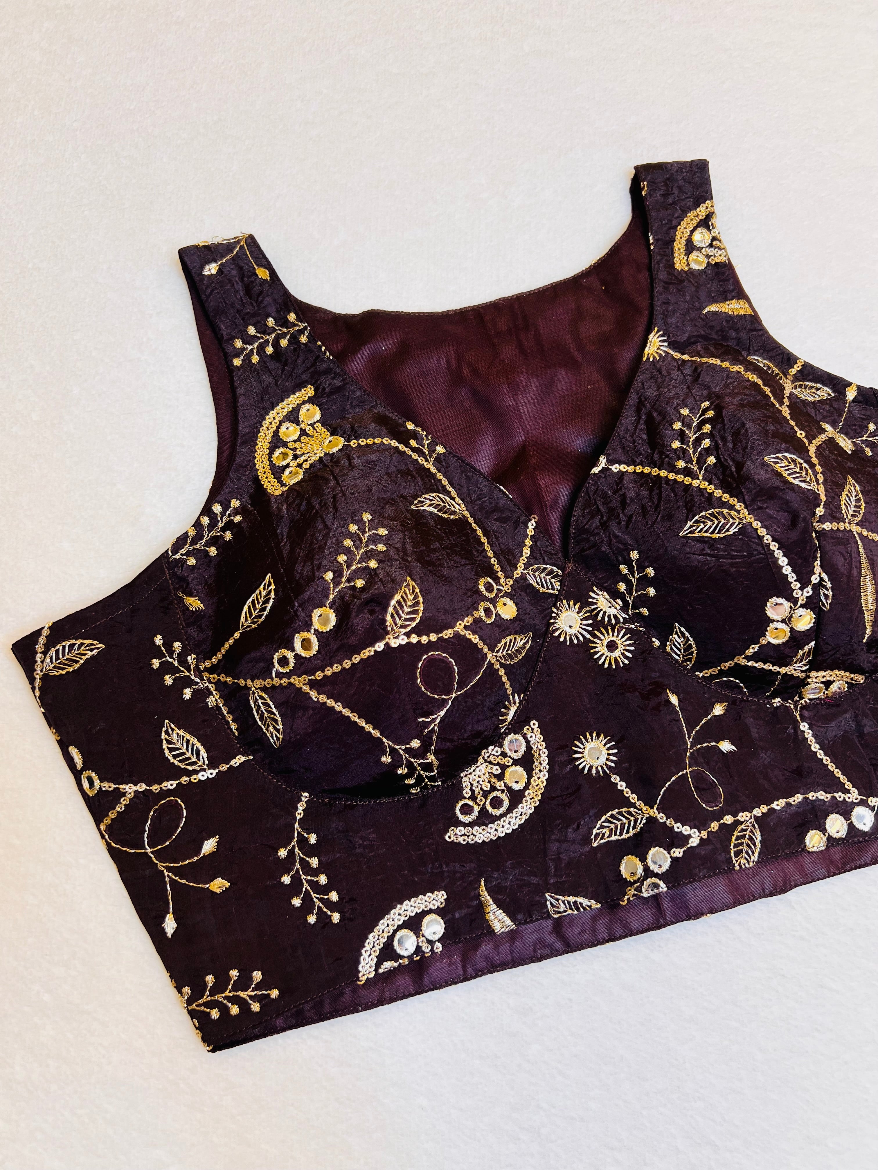 Coffee organza sleeveless padded V‑neck blouse fully stitched women’s ethnic top on flat background