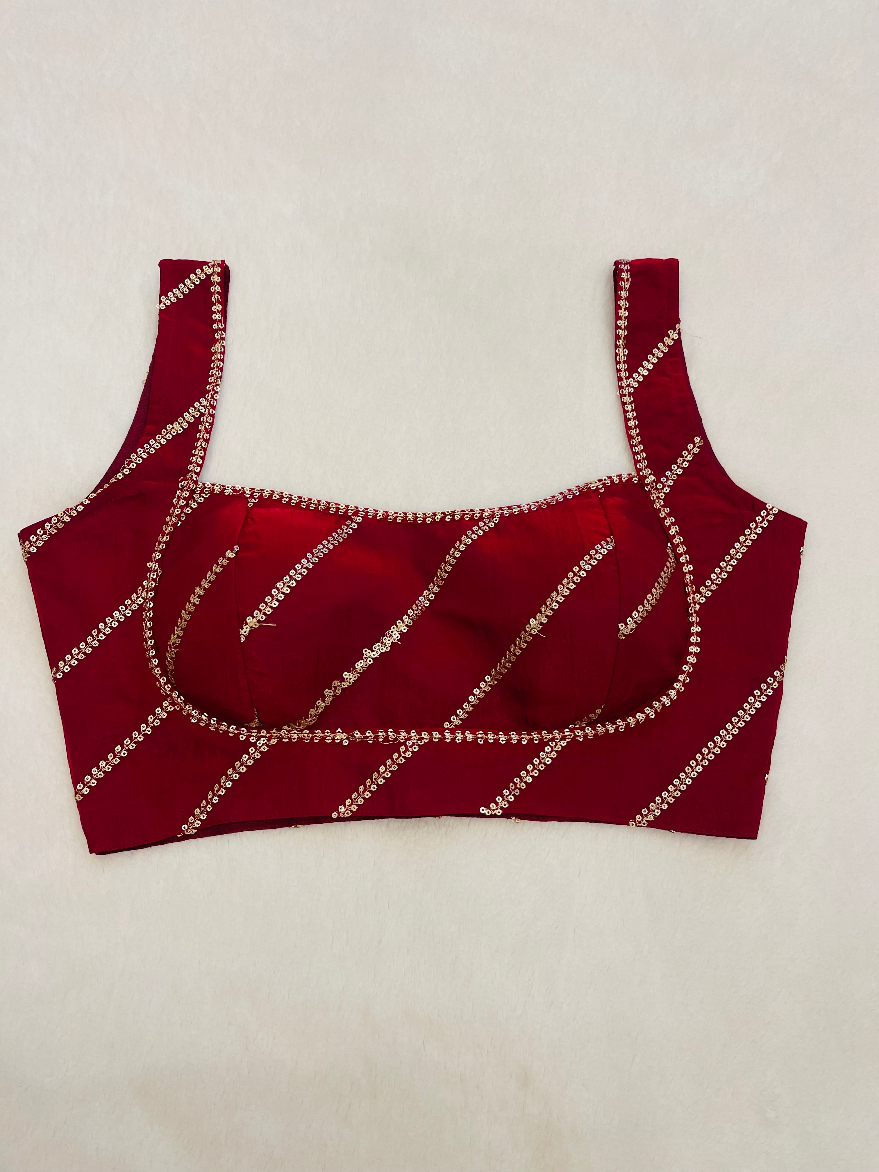 Divine maroon sleeveless blouse