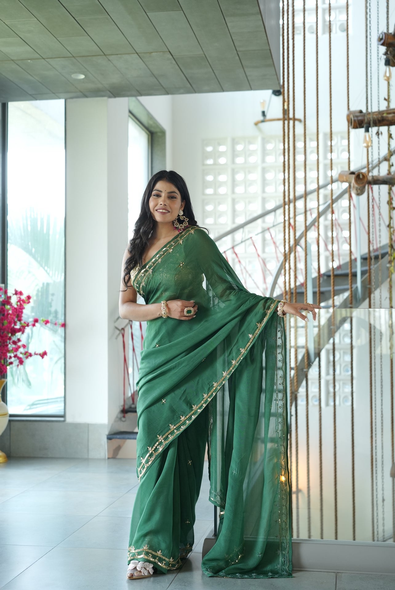 Handmade organza saree in deep green with embroidery