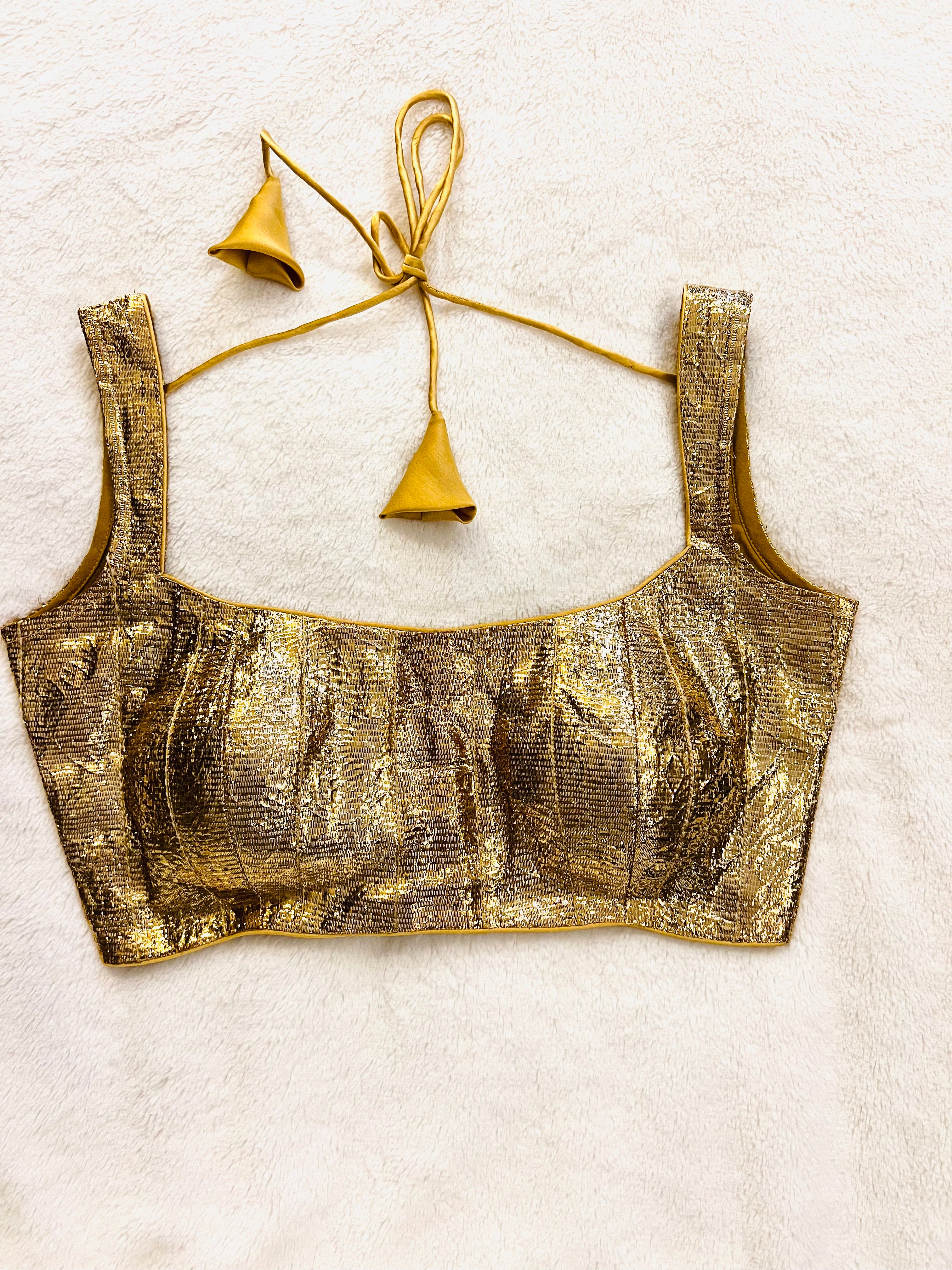 Golden Lampi sleeveless blouse with boat neck and gotta work