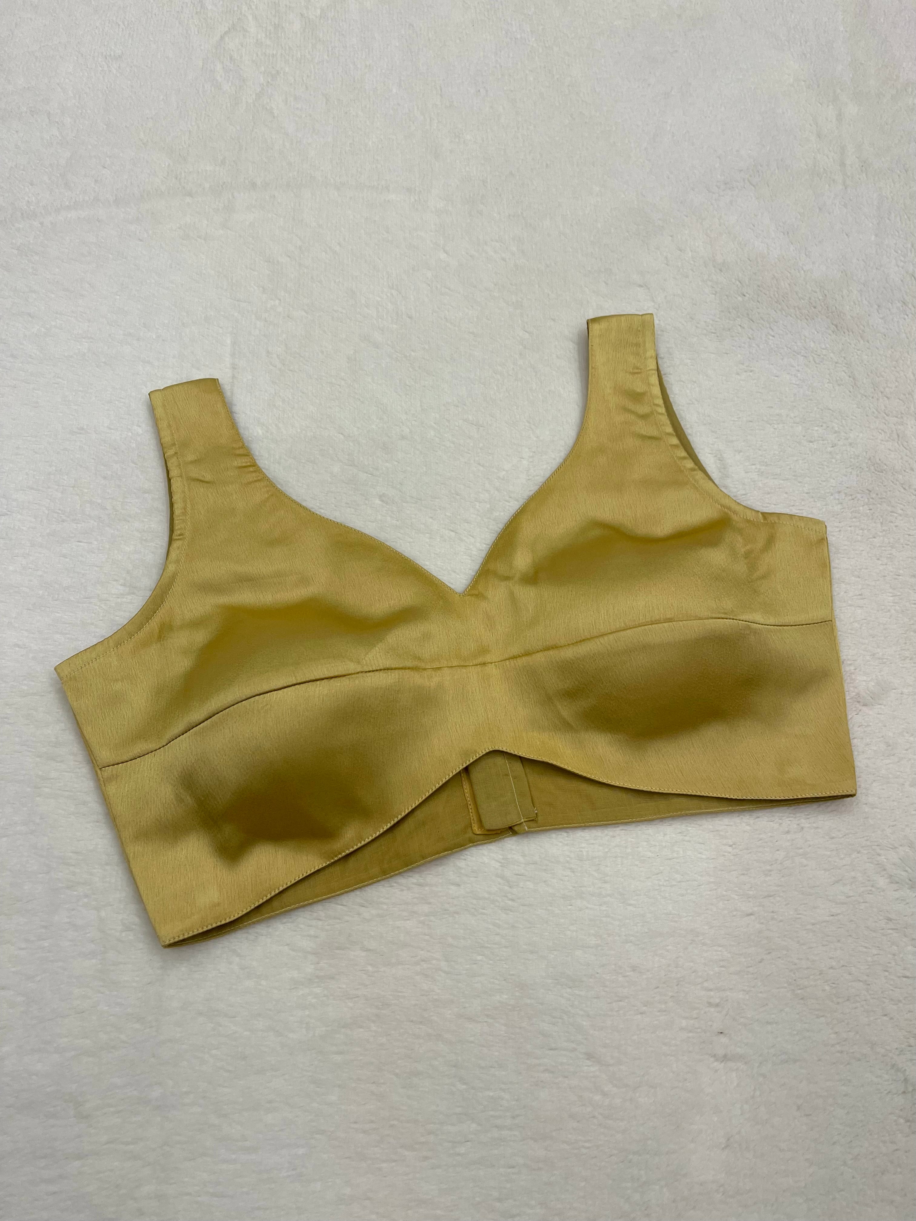 Women Golden satin sleeveless padded V-neck fully stitched blouse