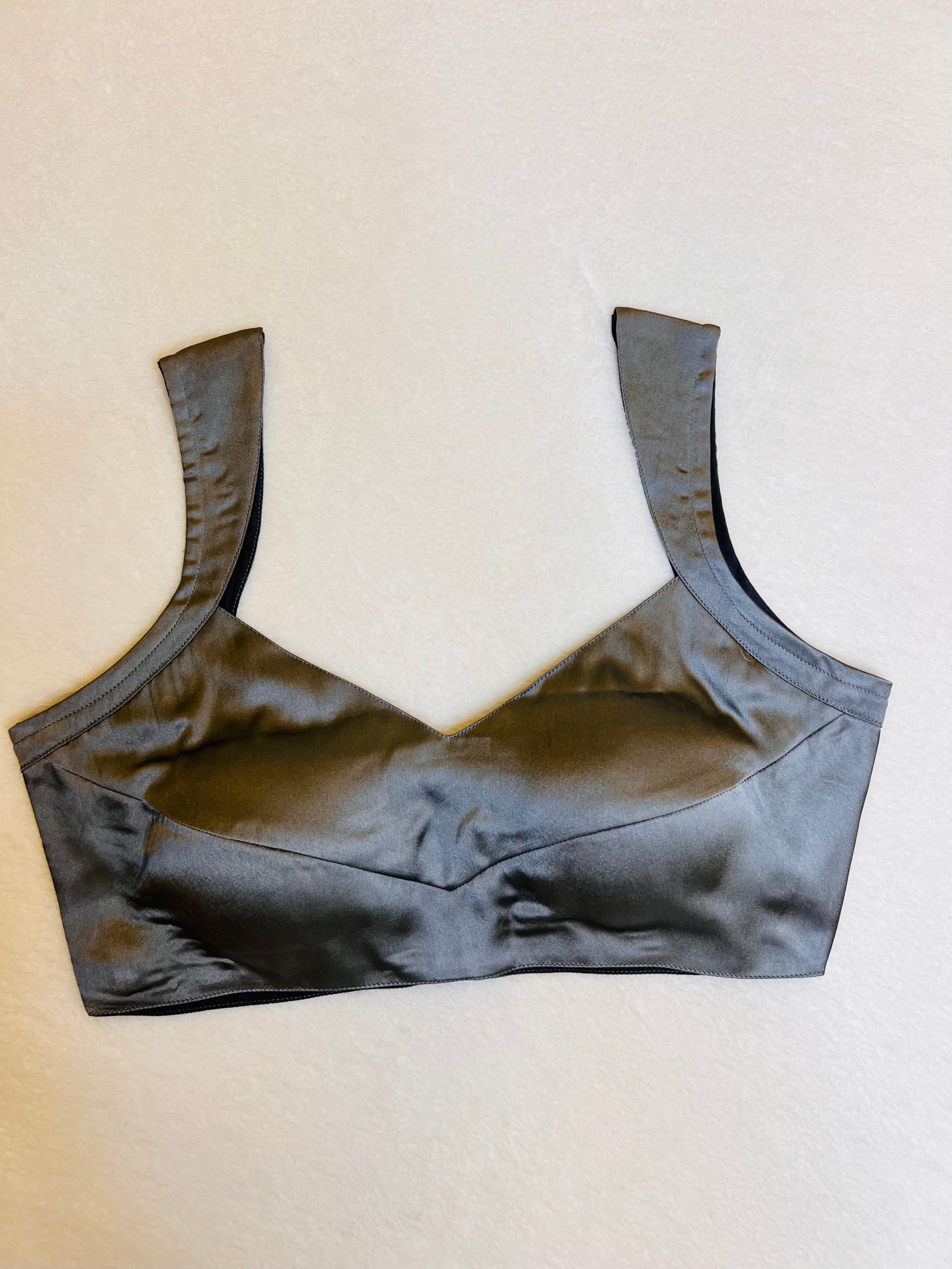 Grey satin sleeveless padded V-neck blouse fully stitched and displayed on a flat background