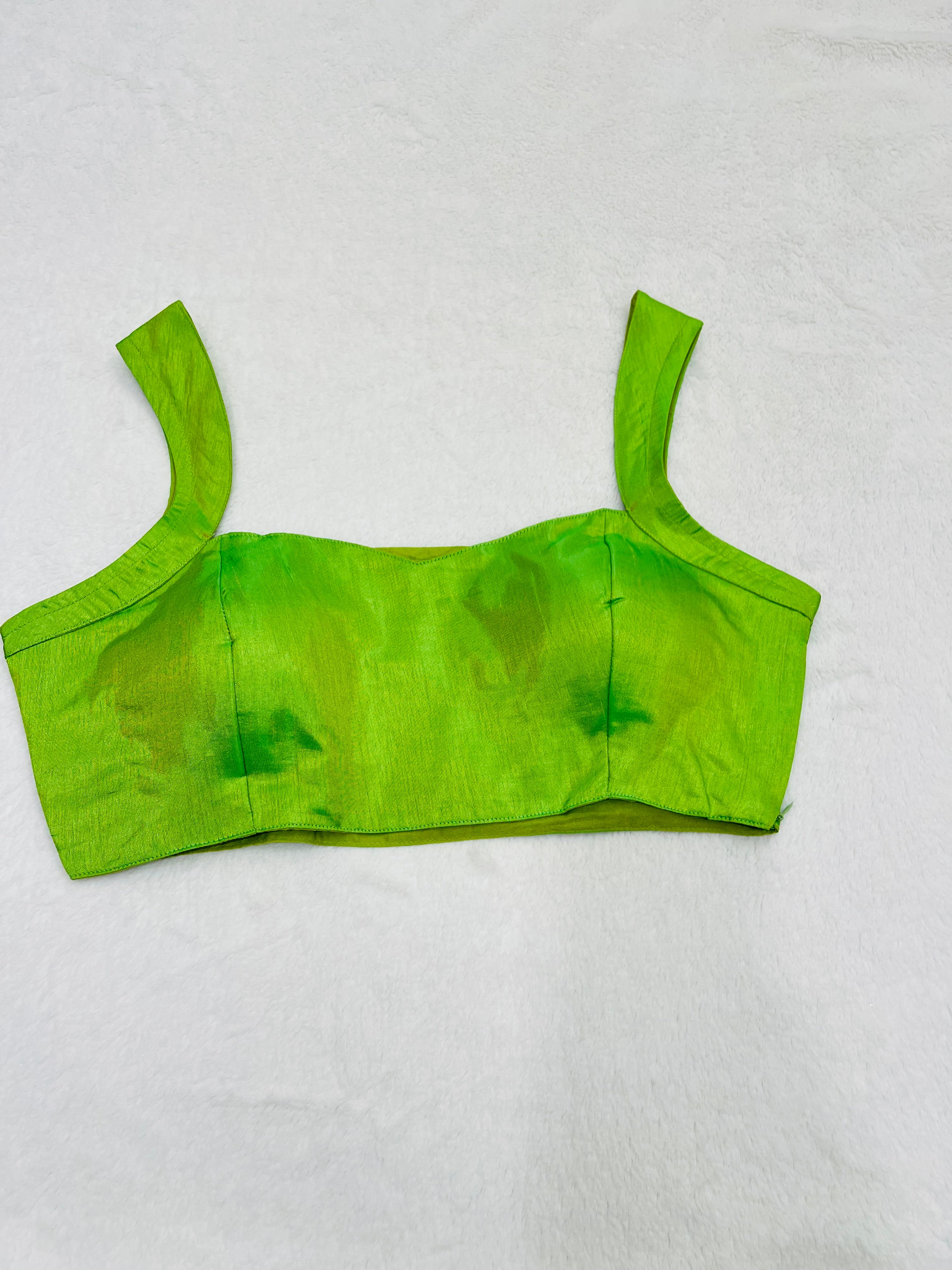 Lime green cotton silk sleeveless blouse with padded cups and V-neck design