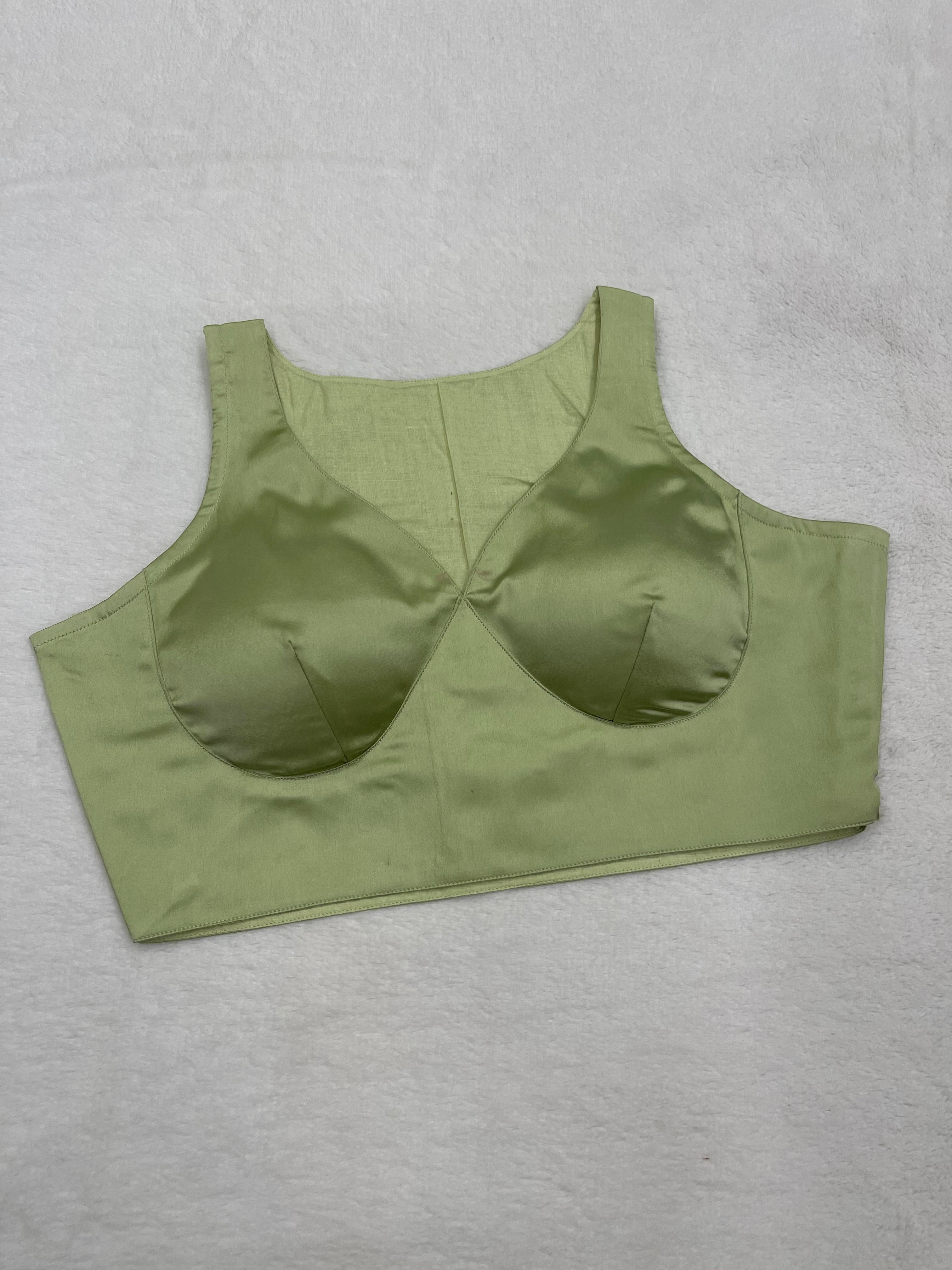 Lime green satin sleeveless padded blouse with V-neck, fully stitched ethnic wear