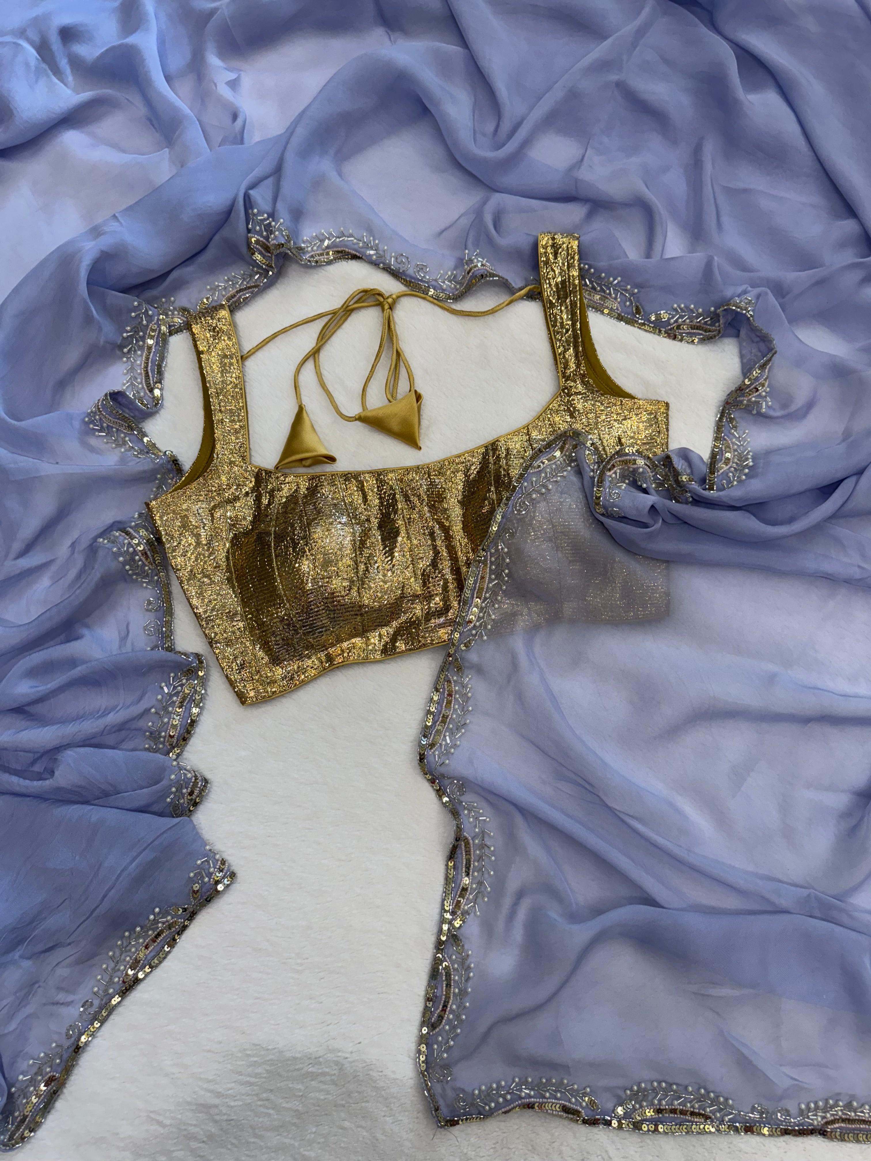 Close-up of sequin and moti embroidery on Neelambari powder blue saree