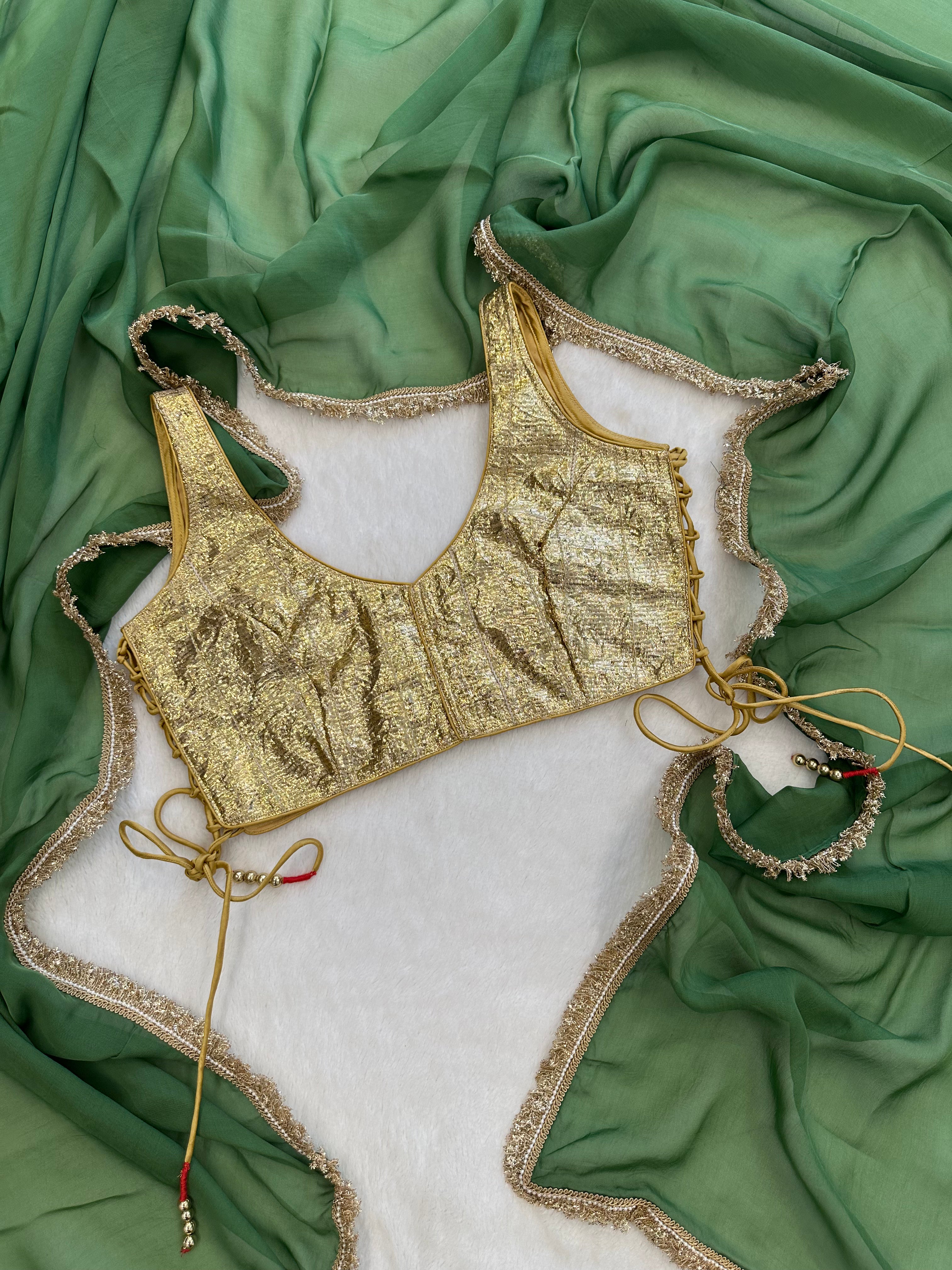 "Draped Olive Aura organza saree showcasing its lightweight fall"