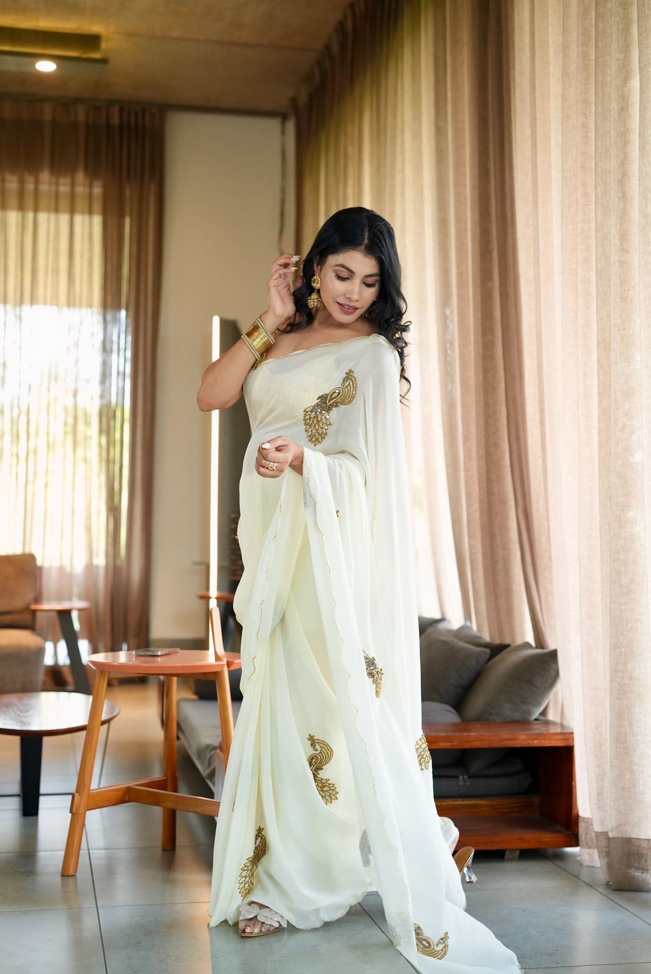 Designer off-white organza saree with handcrafted embroidery