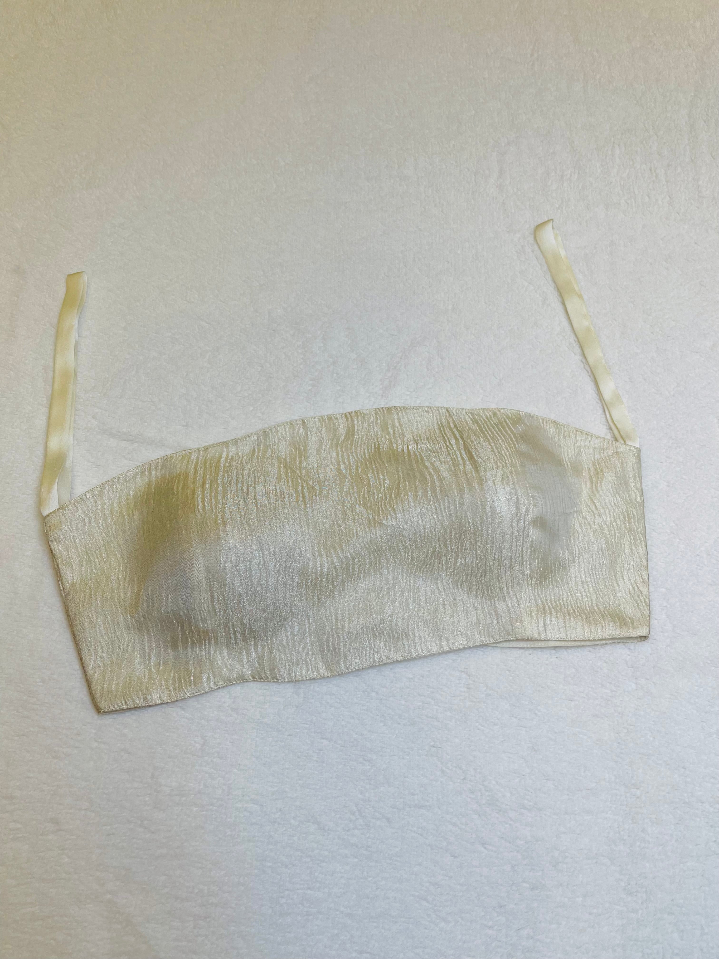 Off‑white tissue silk padded sleeveless blouse with boat neckline – fully stitched ethnic wear top