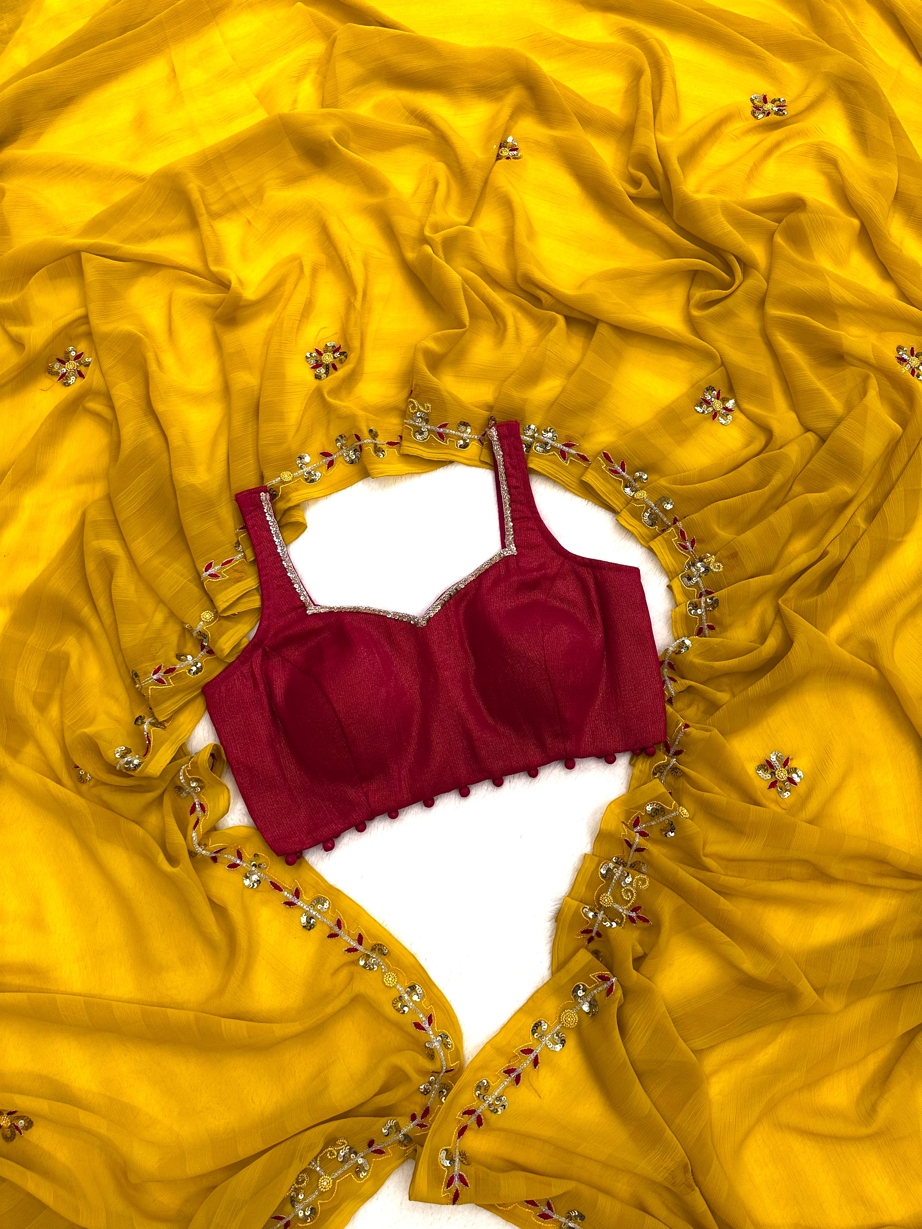 Soft georgette saree with antique handwork and stitched blouse