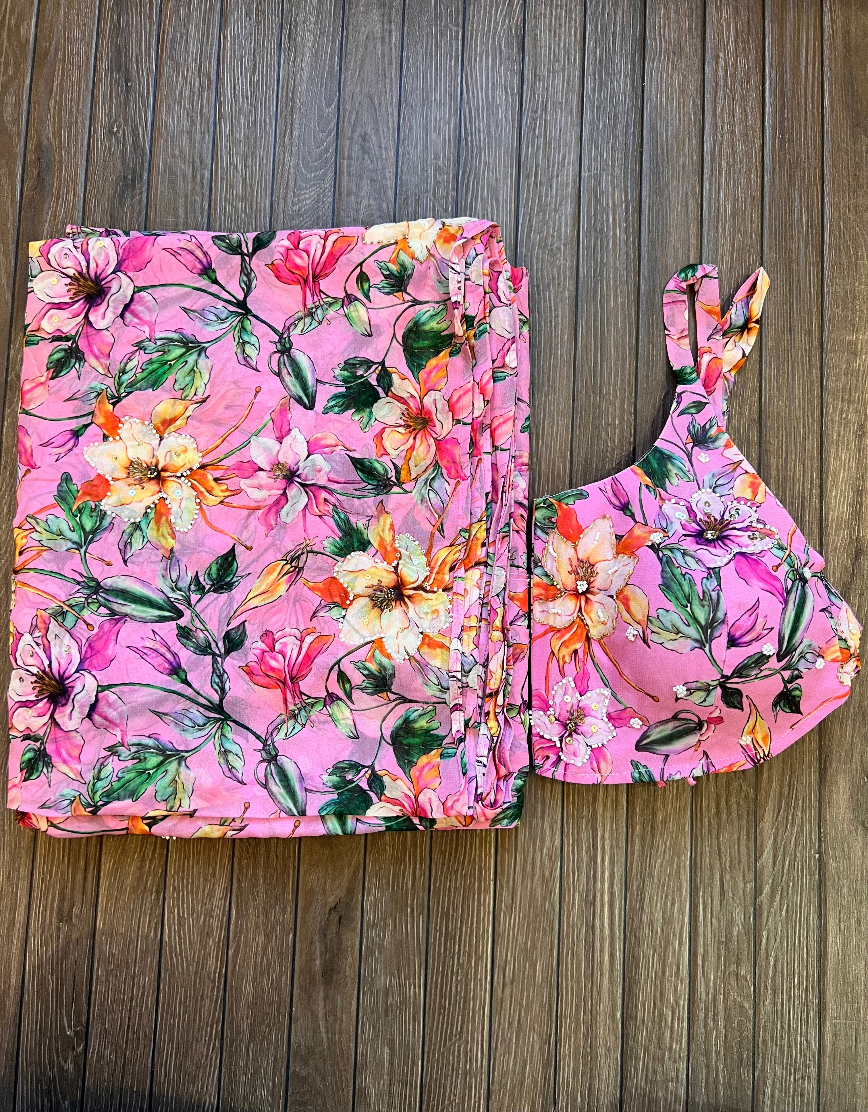 Pink georgette saree with stitched blouse