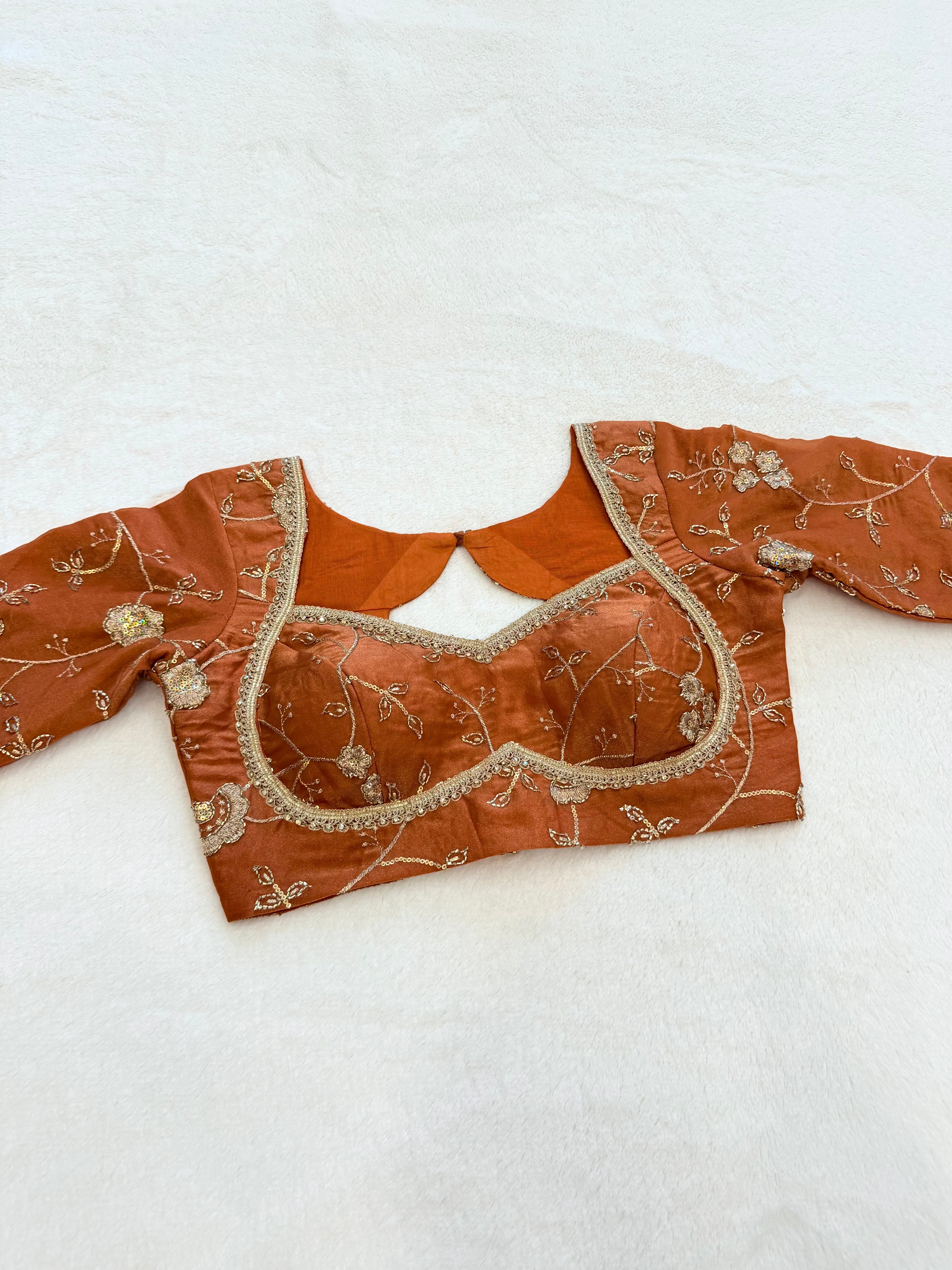 Rust organza dress with sweetheart neckline and elbow sleeves