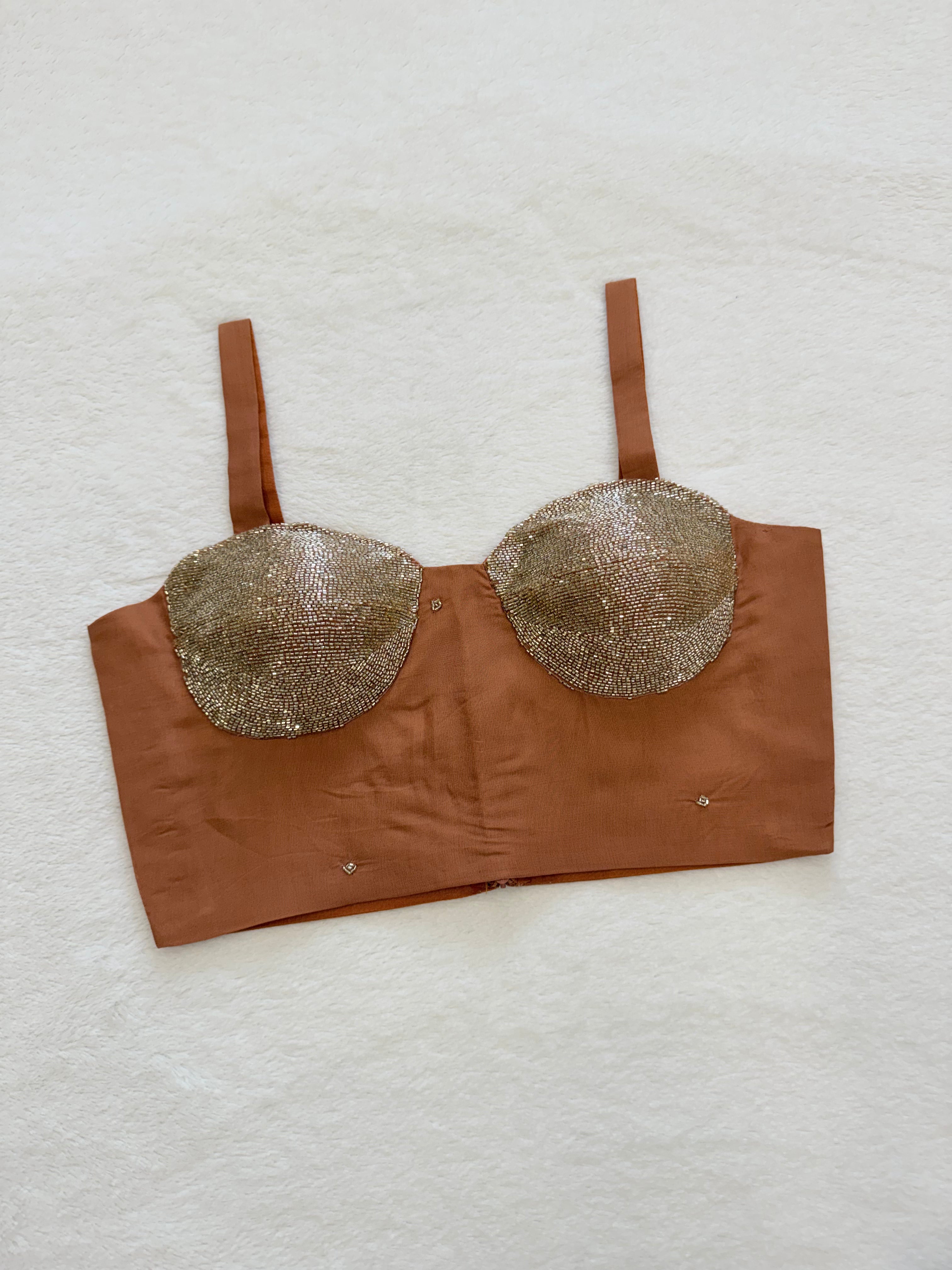 Rust organza sleeveless padded blouse with V-neck, fully stitched ethnic wear