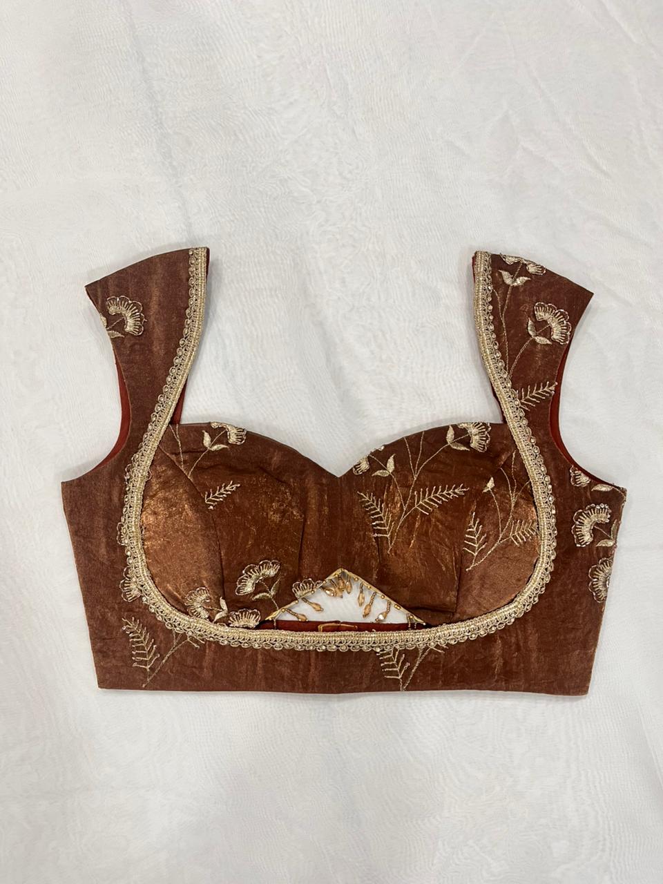 Rust brown organza padded blouse with sweetheart neckline and sleeveless design