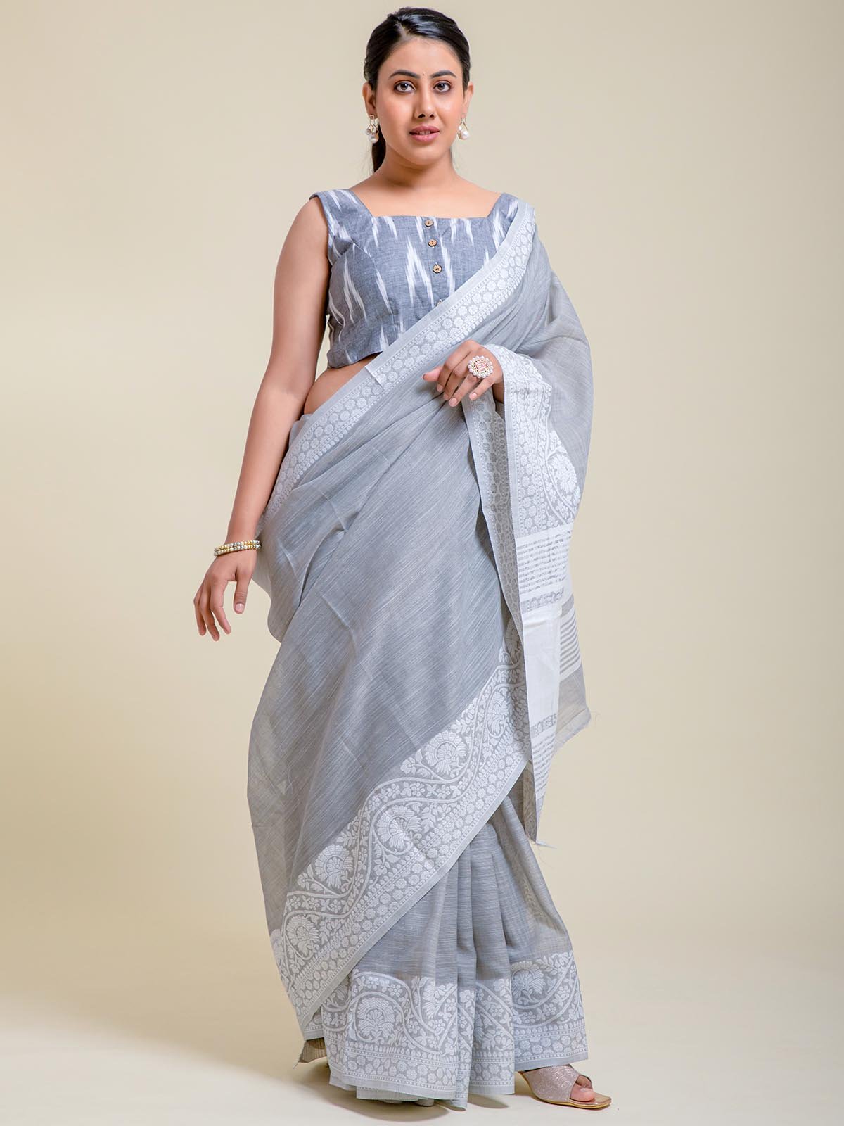 “Lightweight cotton silk saree in grey with delicate embroidery”