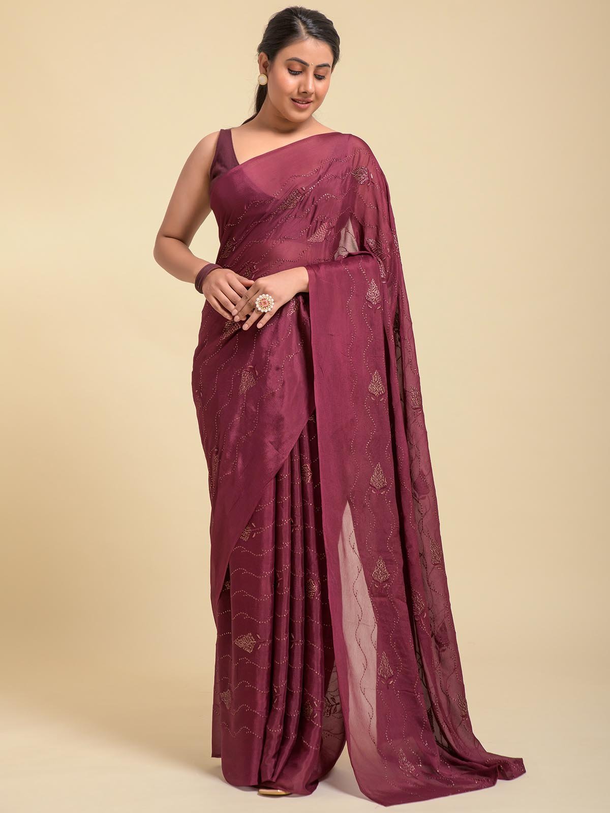 Wine viscose georgette saree with tar zari work and matching satin blouse piece”