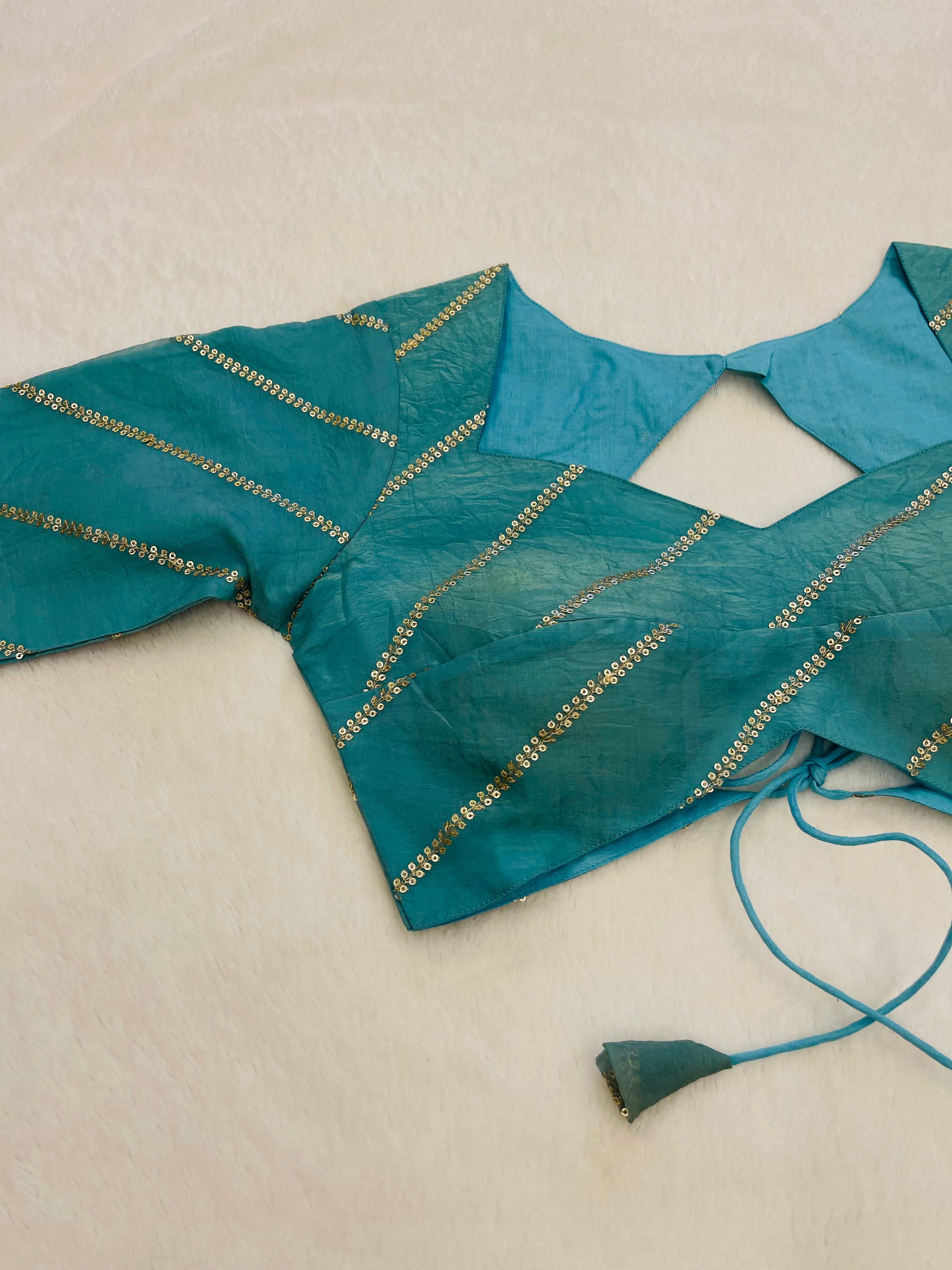 Divine sky blue blue organza festive wear blouse