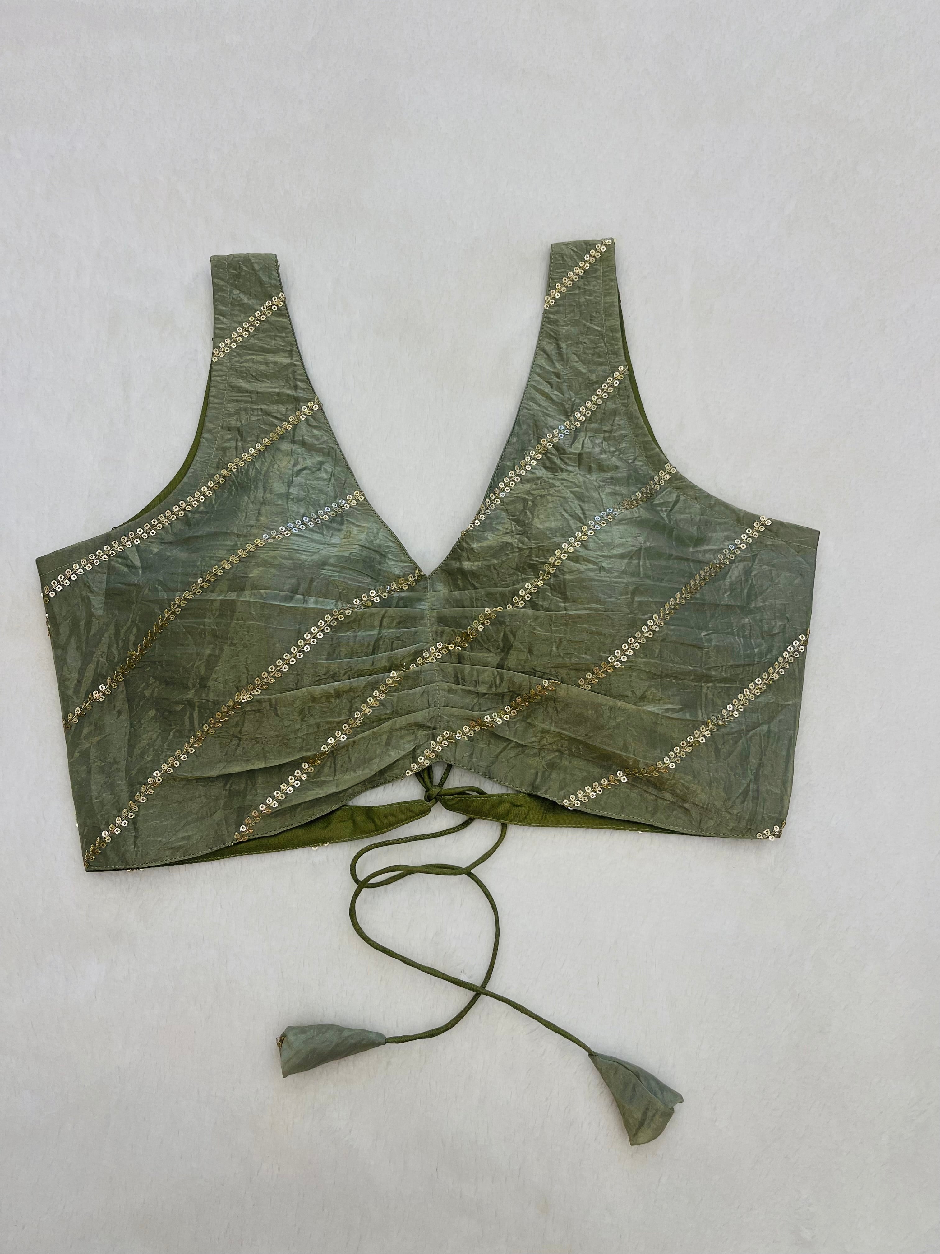 Divine light green organza festive wear backless blouse