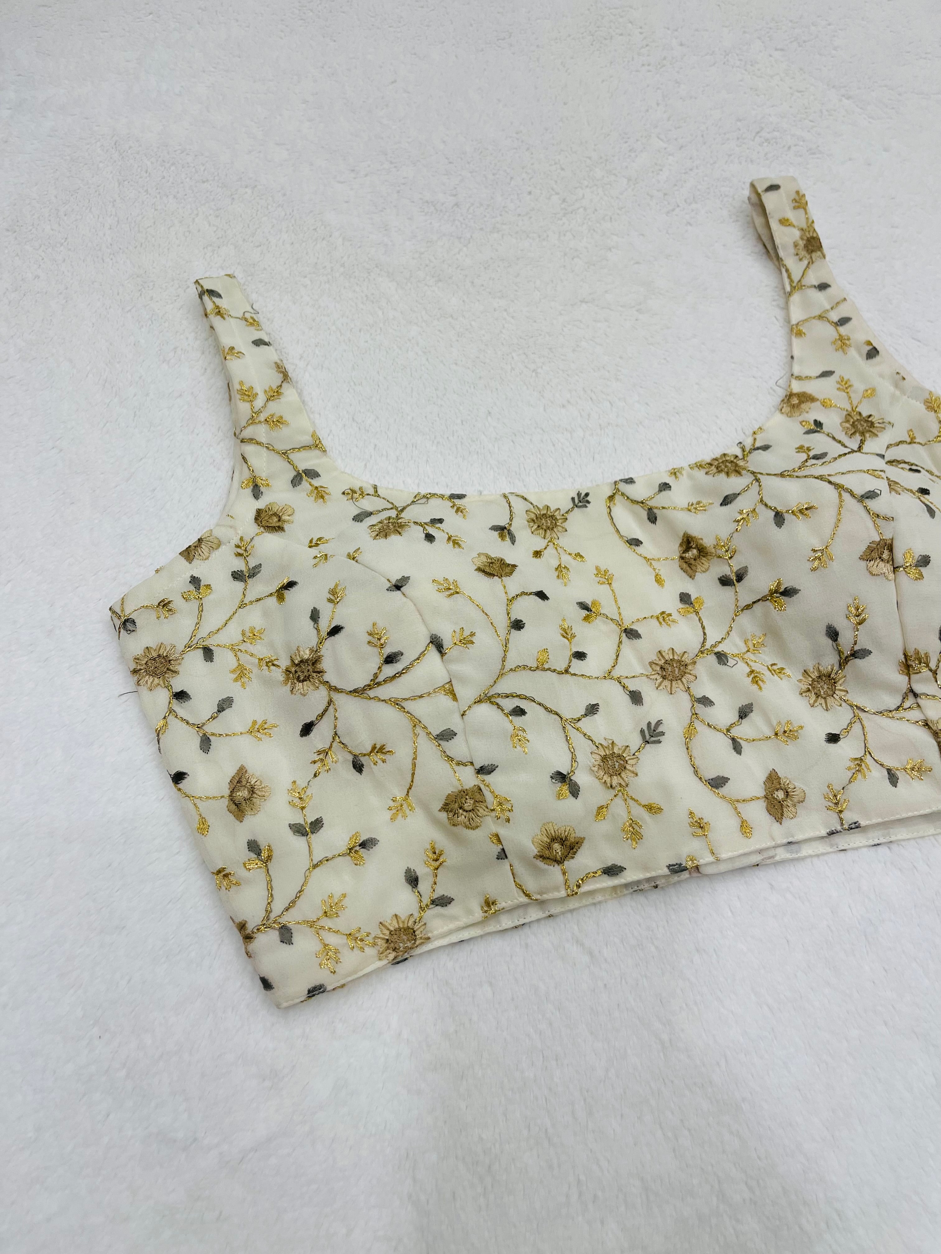 Kaveri white Sleeveless Blouses