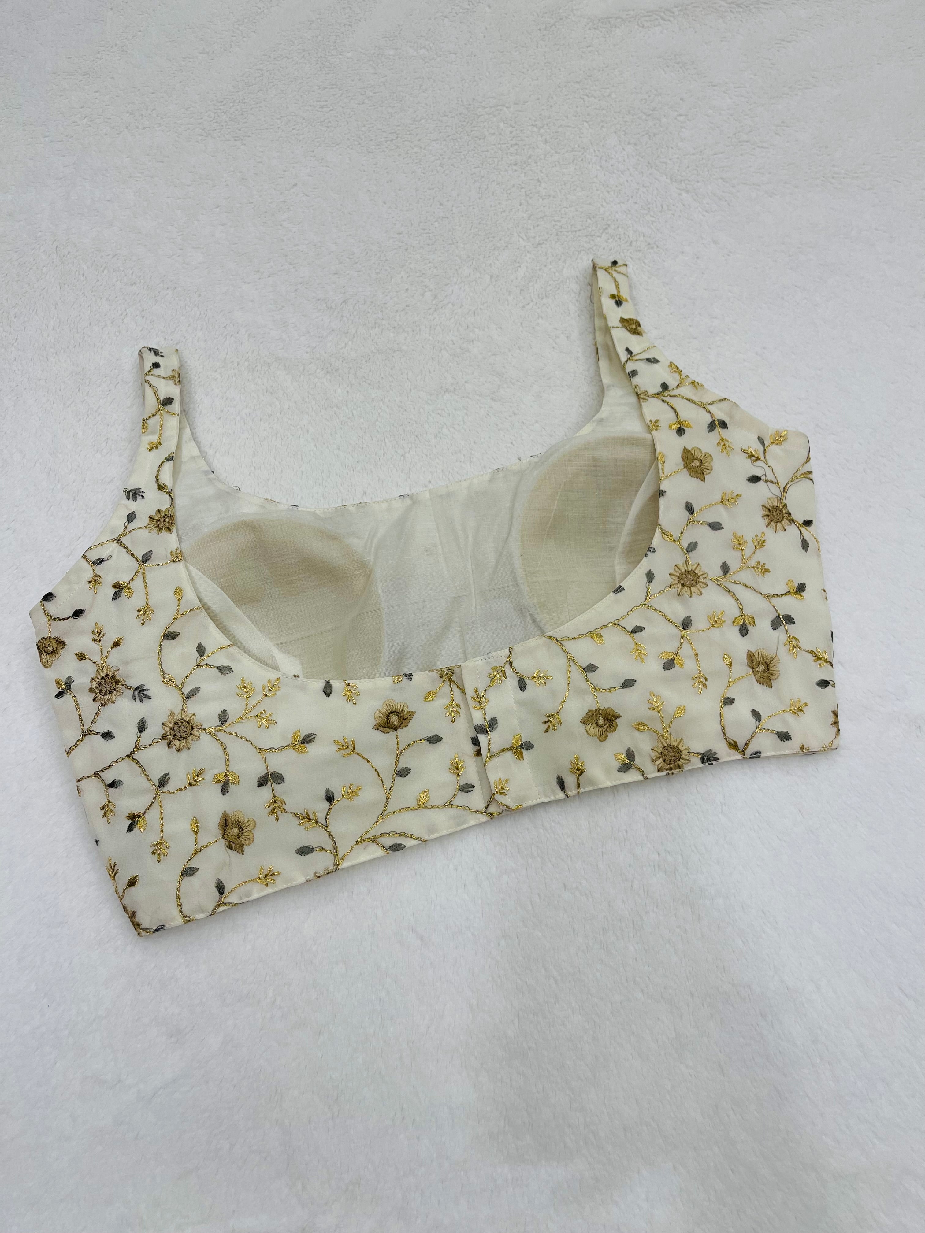 Kaveri white Sleeveless Blouses