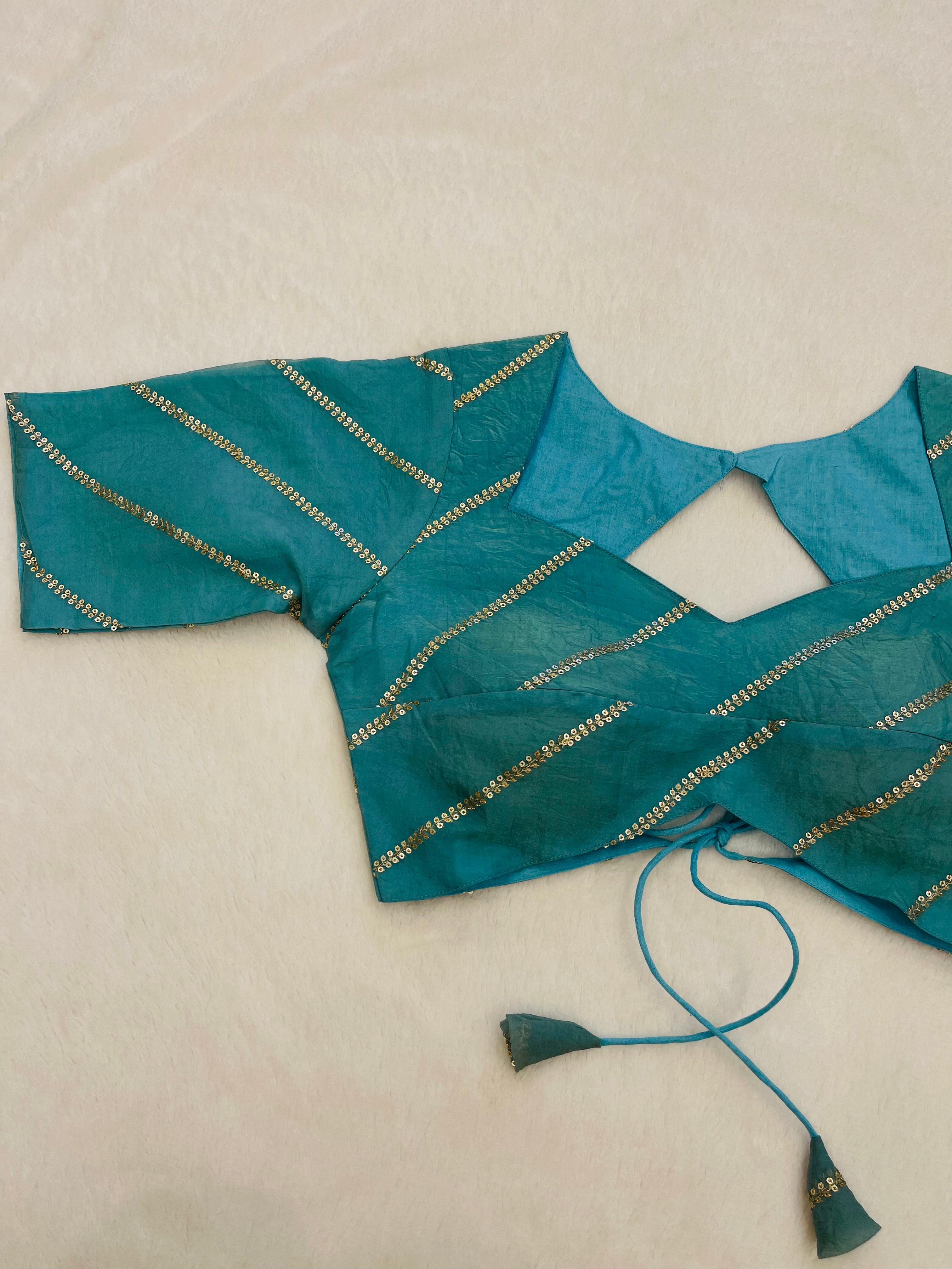 Divine sky blue blue organza festive wear blouse