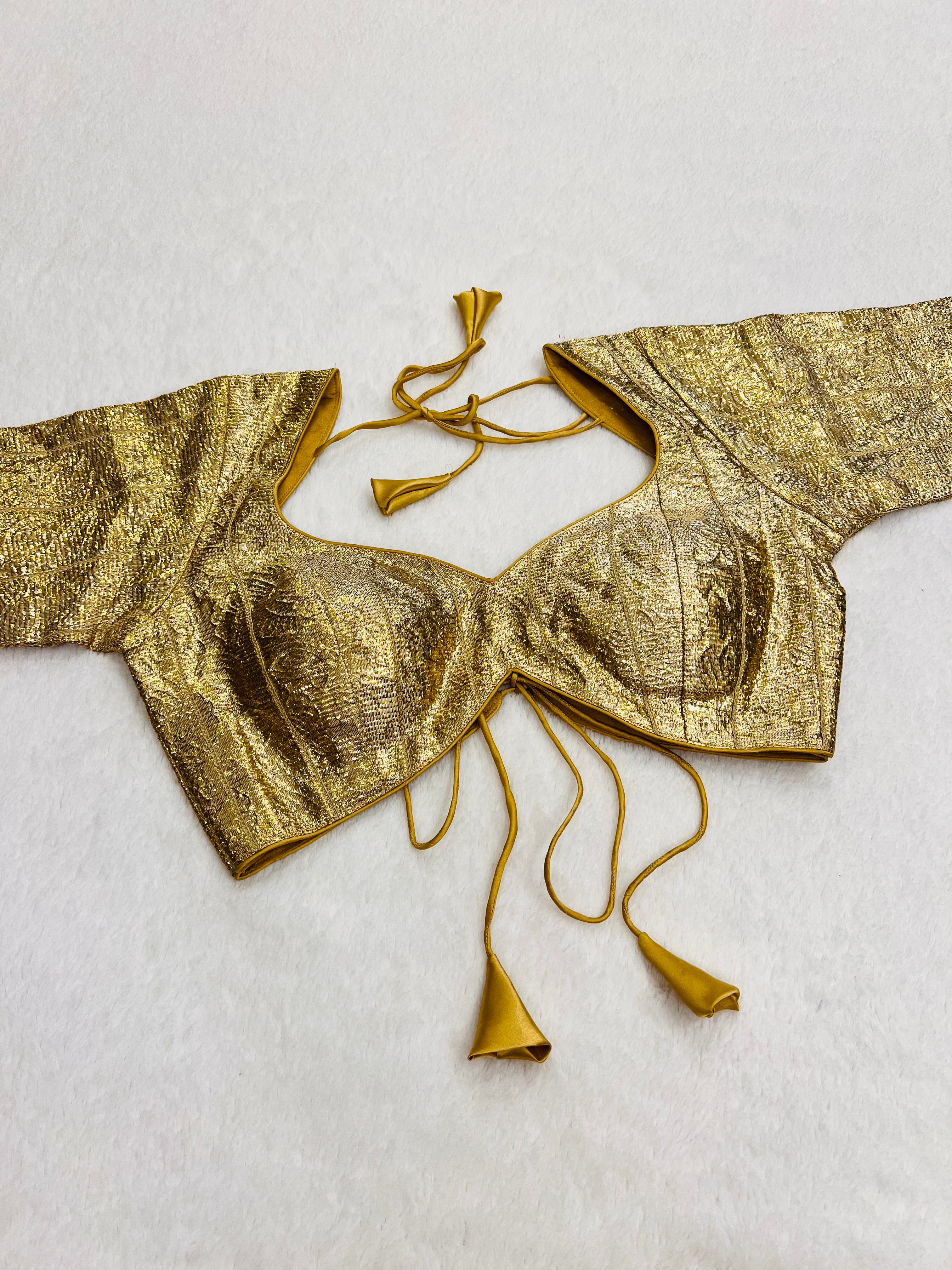 Gold Sabyasachi style blouse with intricate gotta work