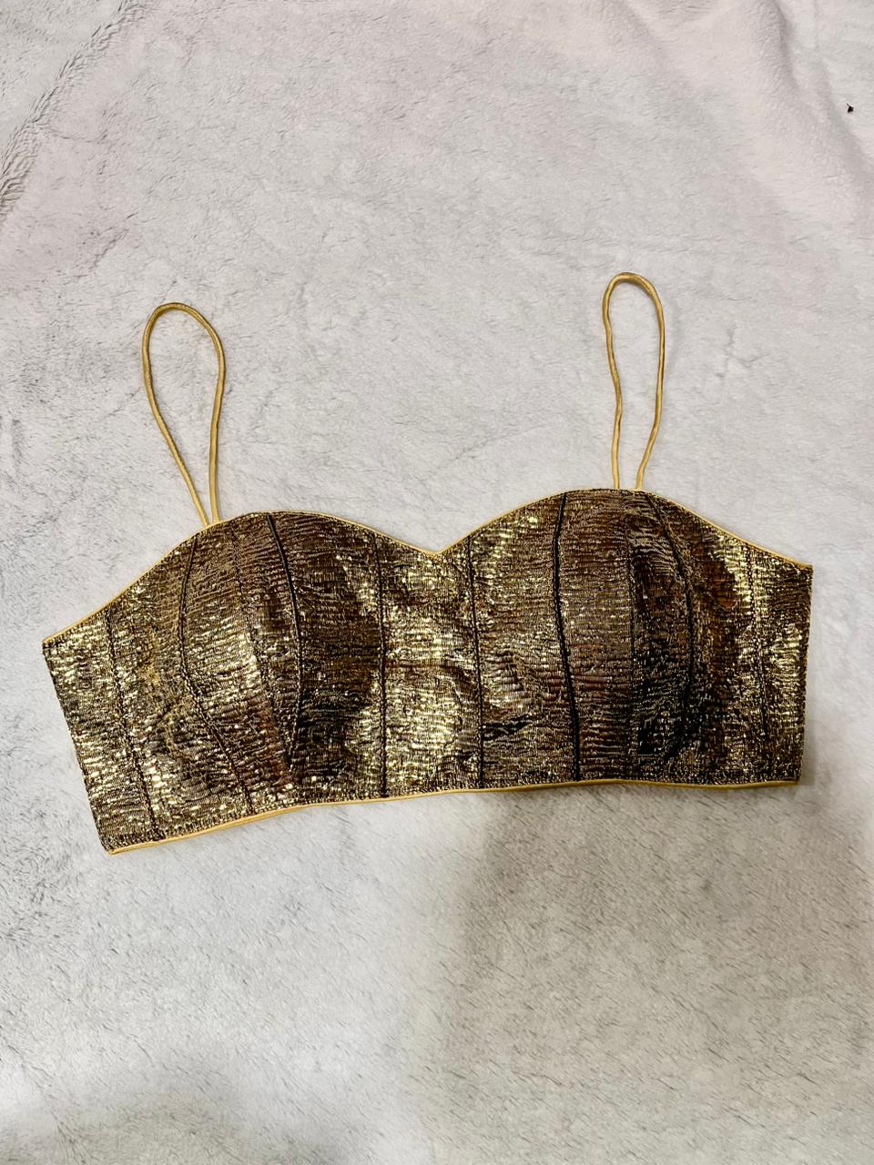 Women’s golden padded blouse with elegant embroidery