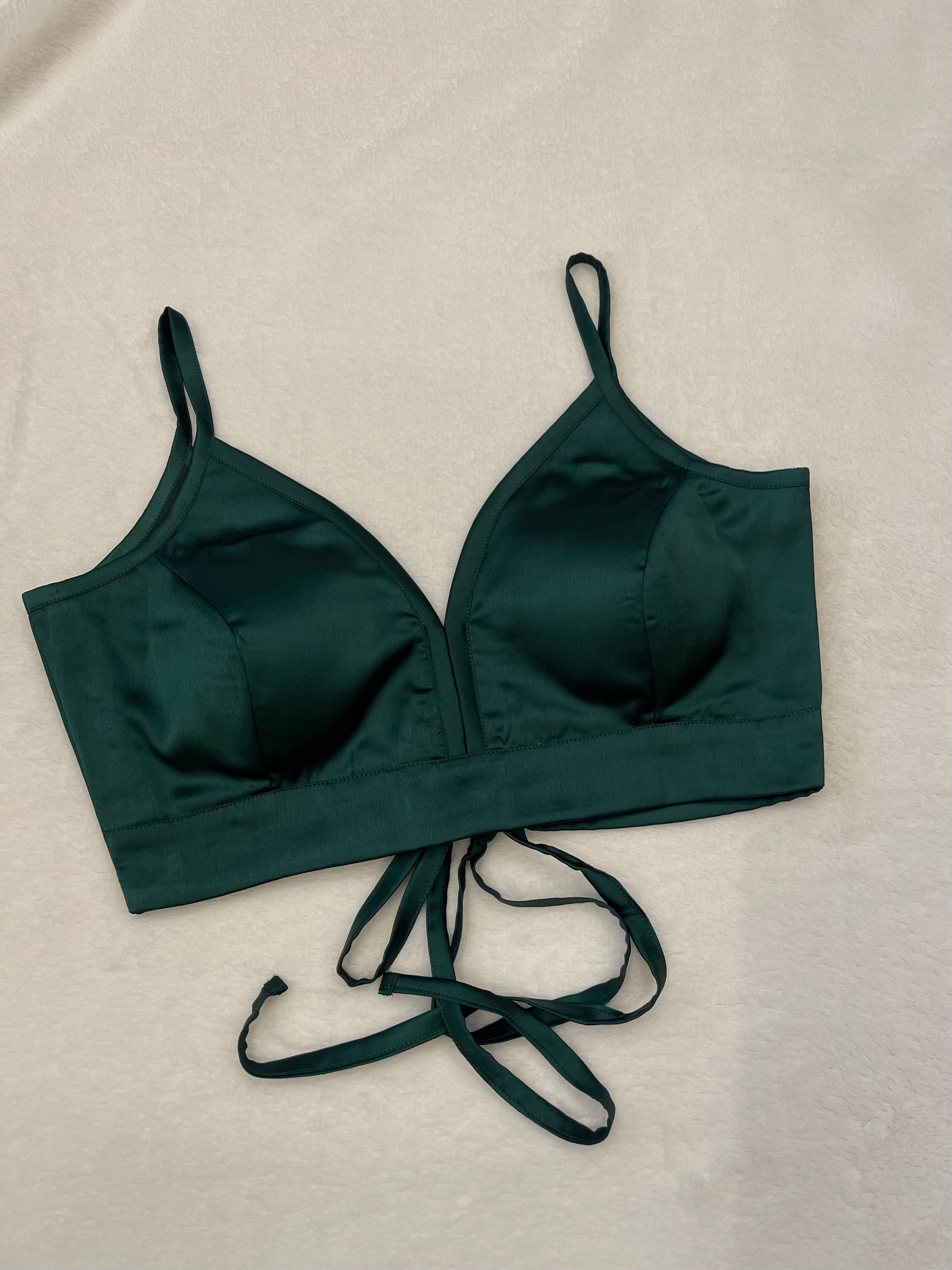 Green satin padded V-neck blouse, fully stitched, displayed on a flat background