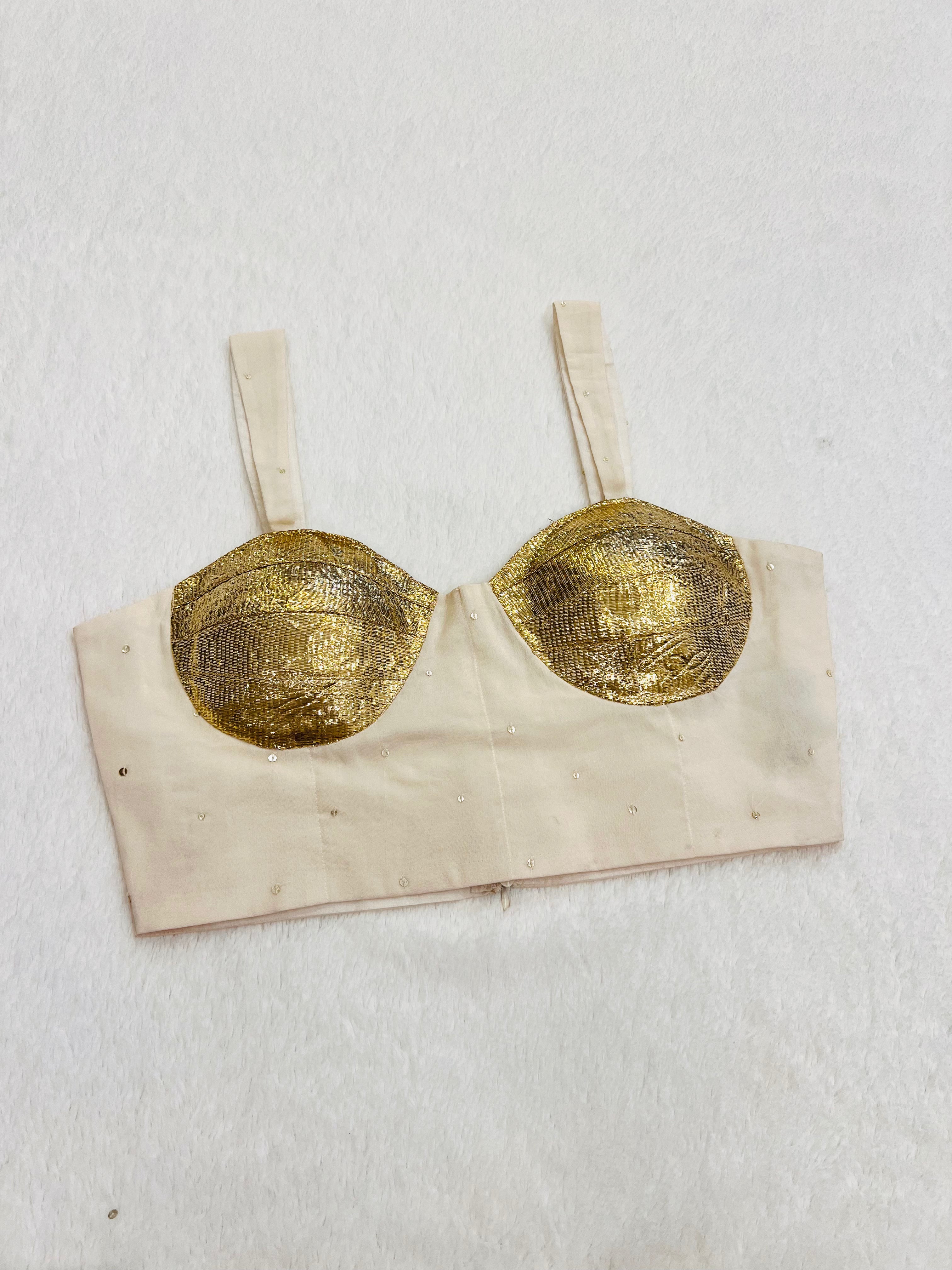 White organza sleeveless padded party wear blouse with V neck