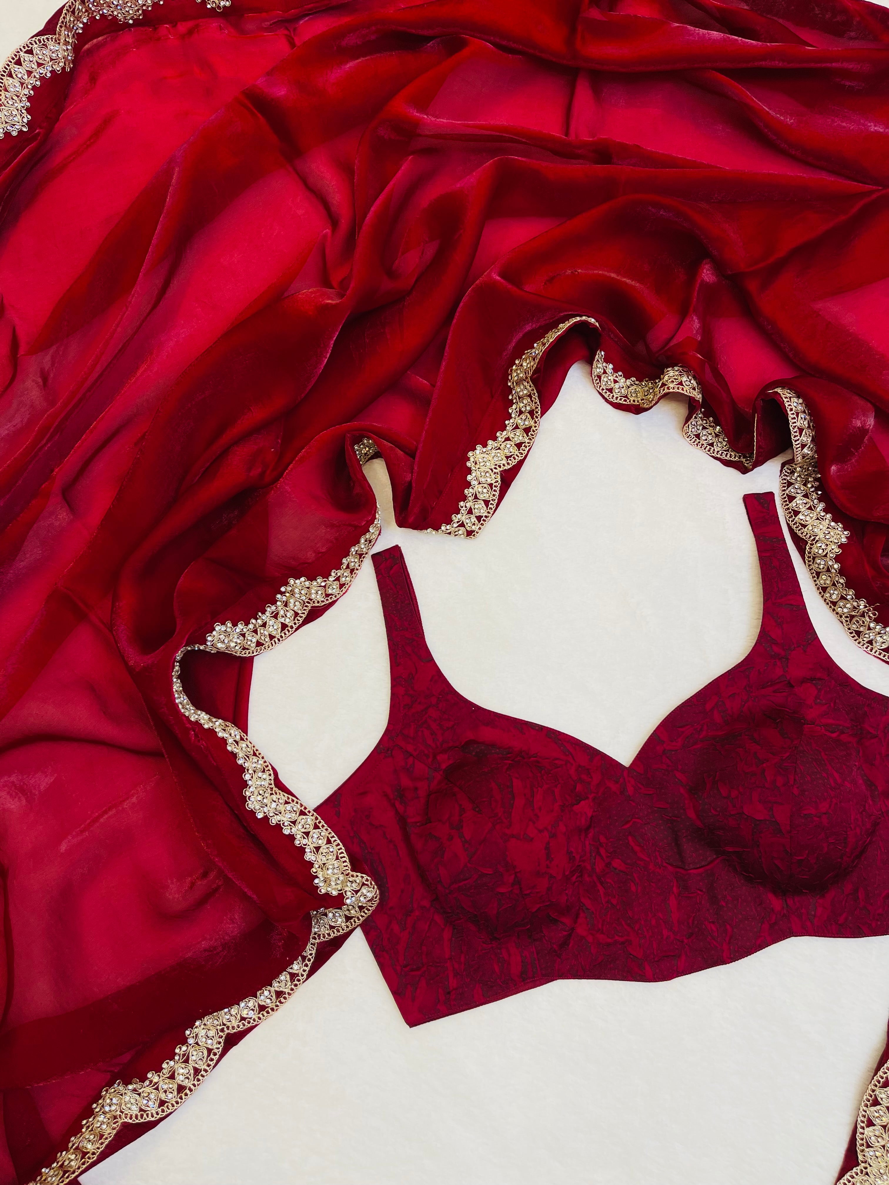 Soft organza saree in elegant finish with maroon blouse