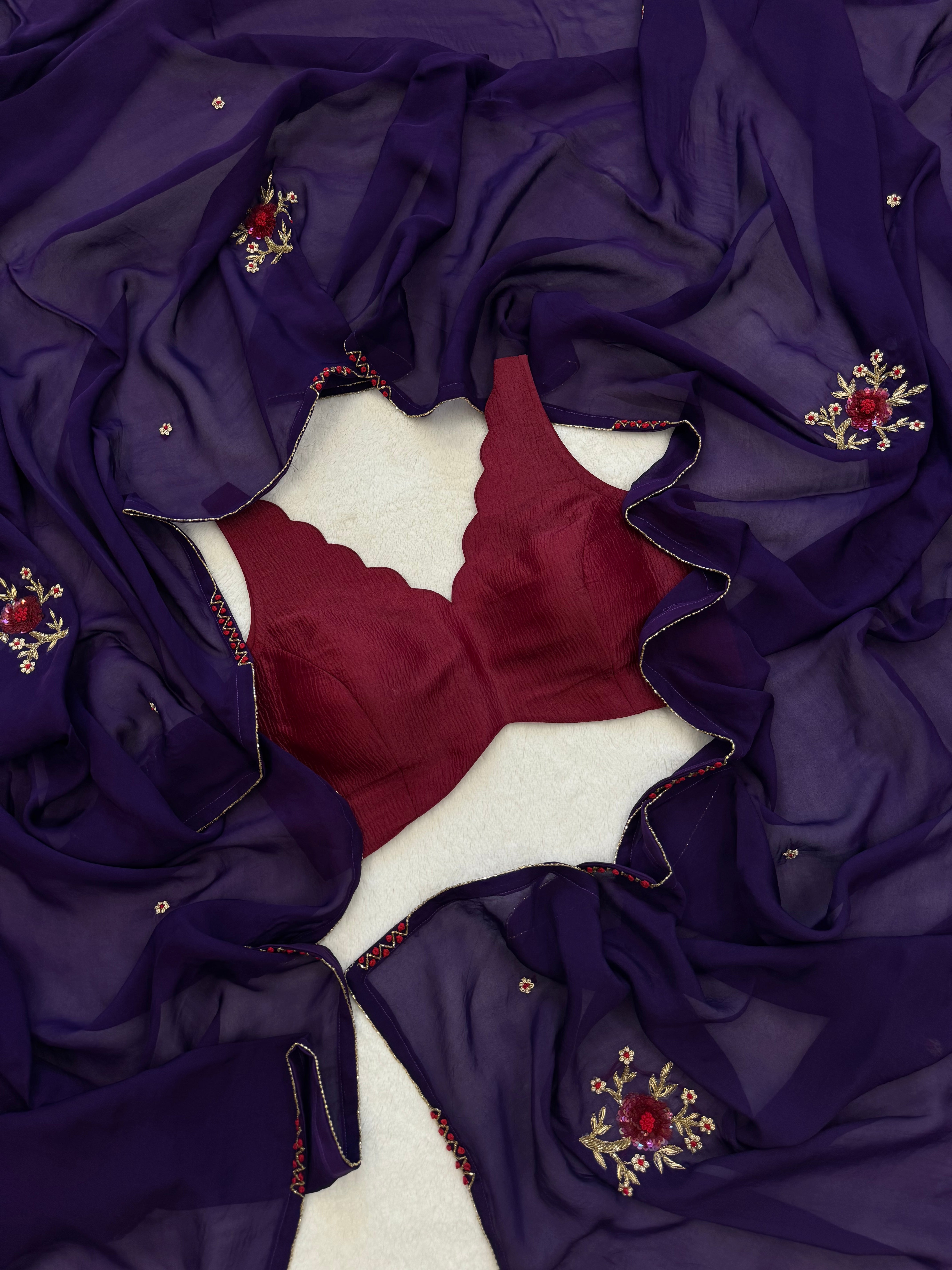 “Organza saree with purple blouse and running piece – handcrafted detailing”