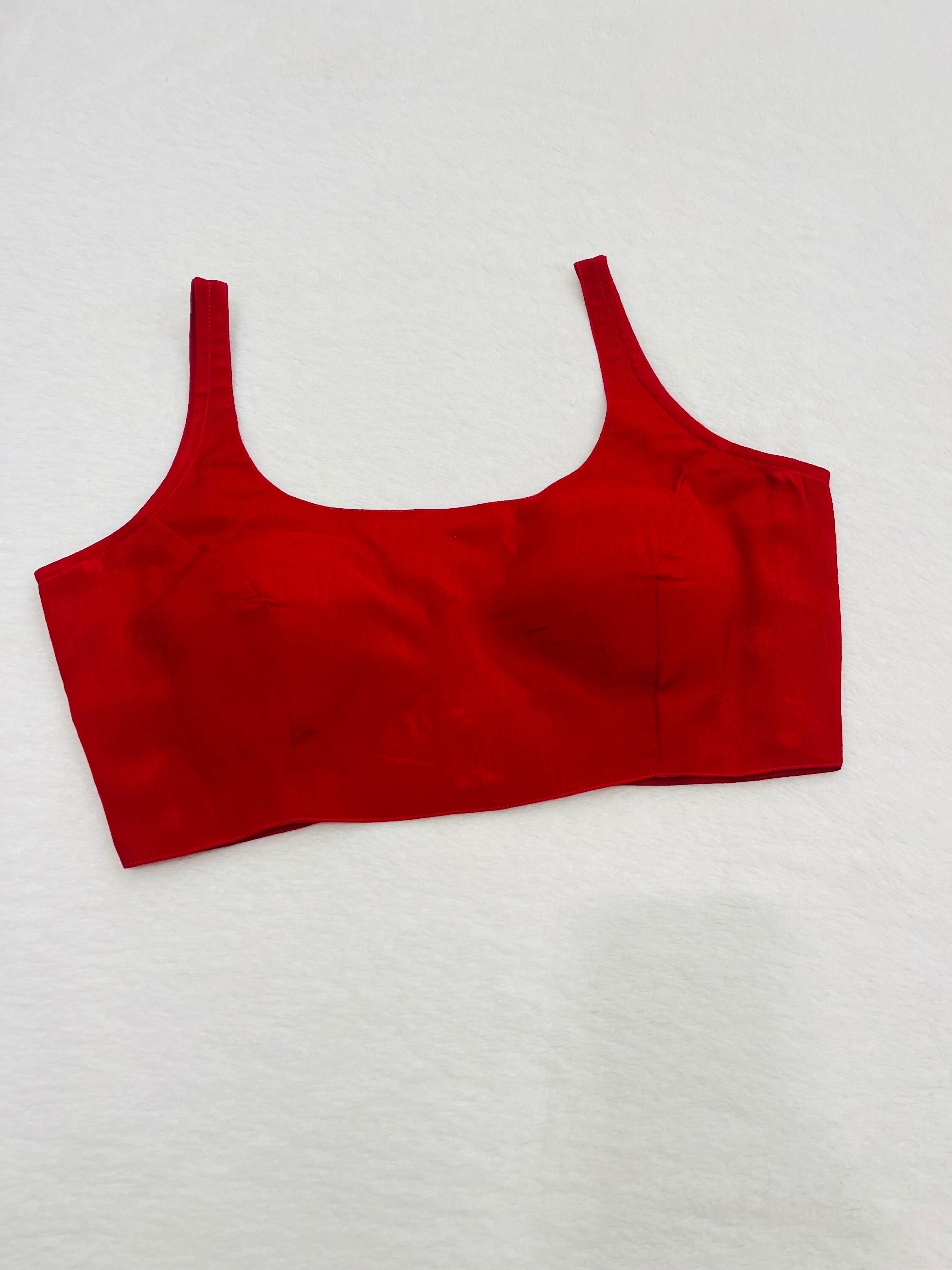 Red chiffon sleeveless padded blouse with round neckline – fully stitched ethnic top on flat background