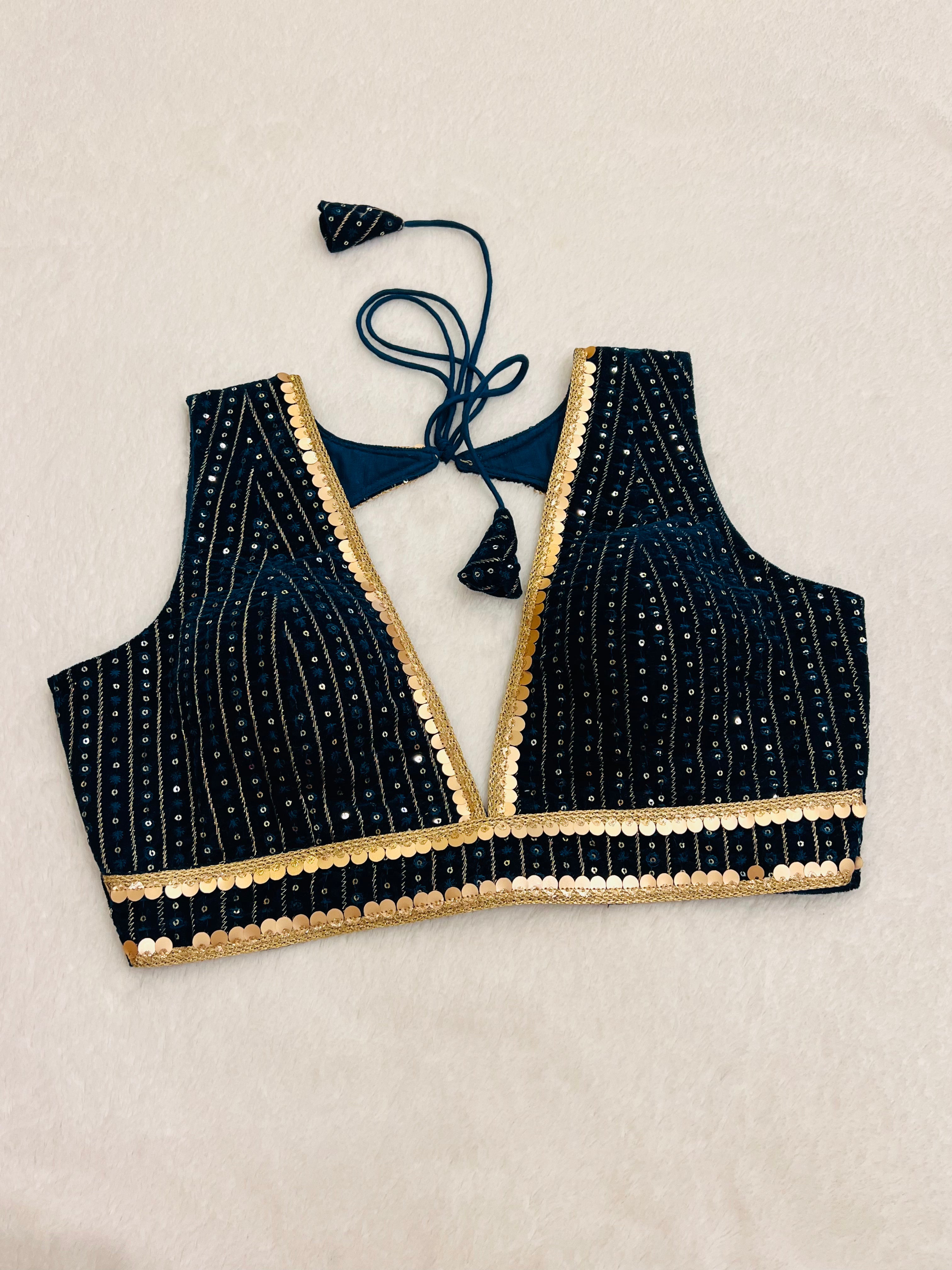 Teal blue velvet sleeveless padded blouse with V-neck