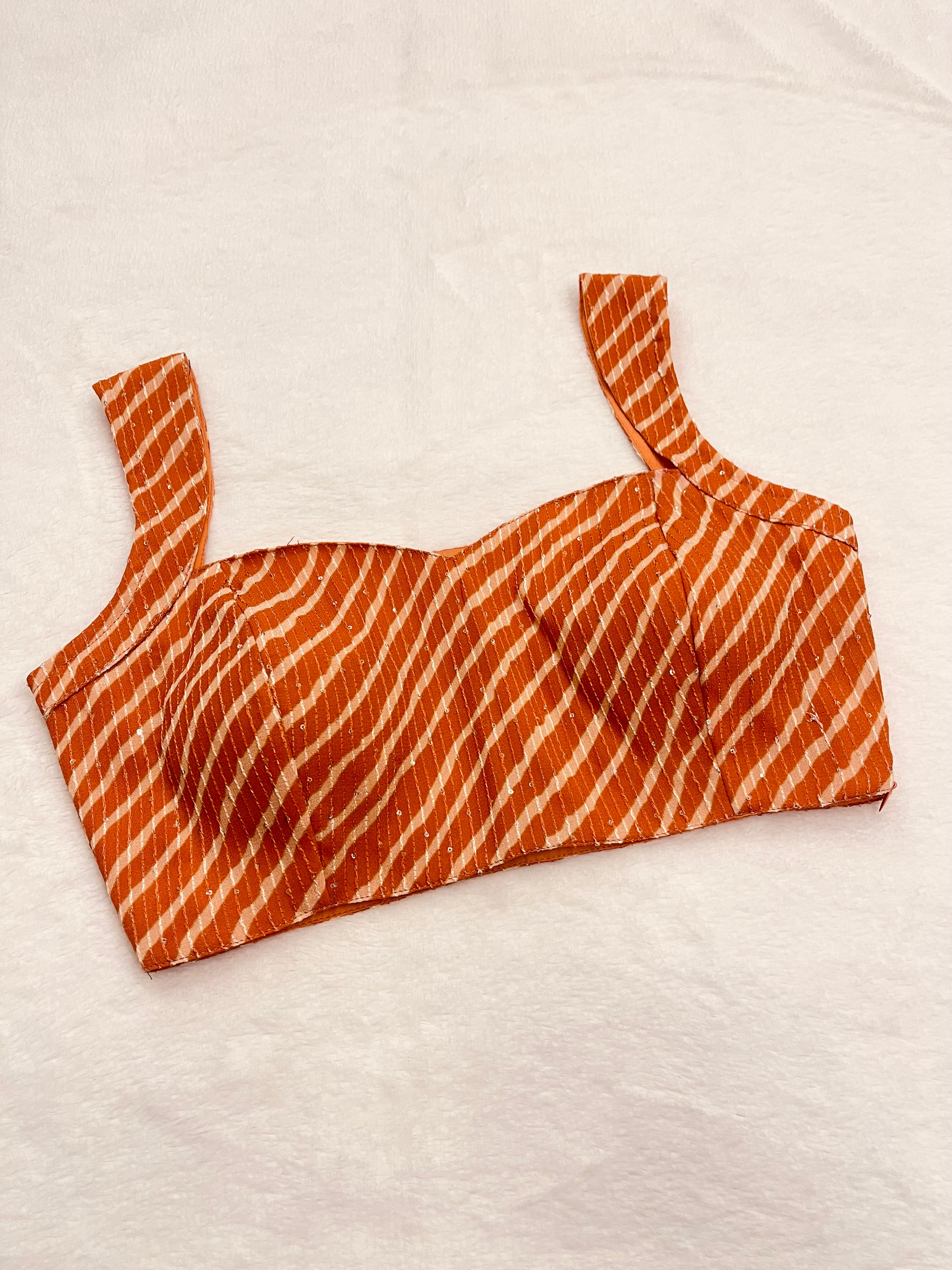 Viscose georgette sleeveless sequin blouse with padded cups and boat neck, available in 4 colors