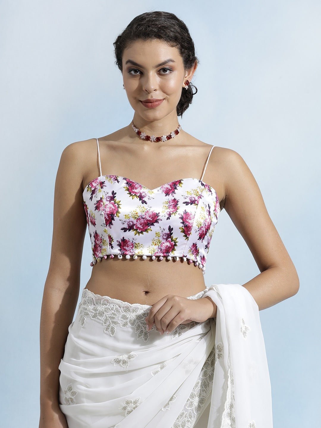 White silk base sleeveless blouse with padded cups and boat neck design