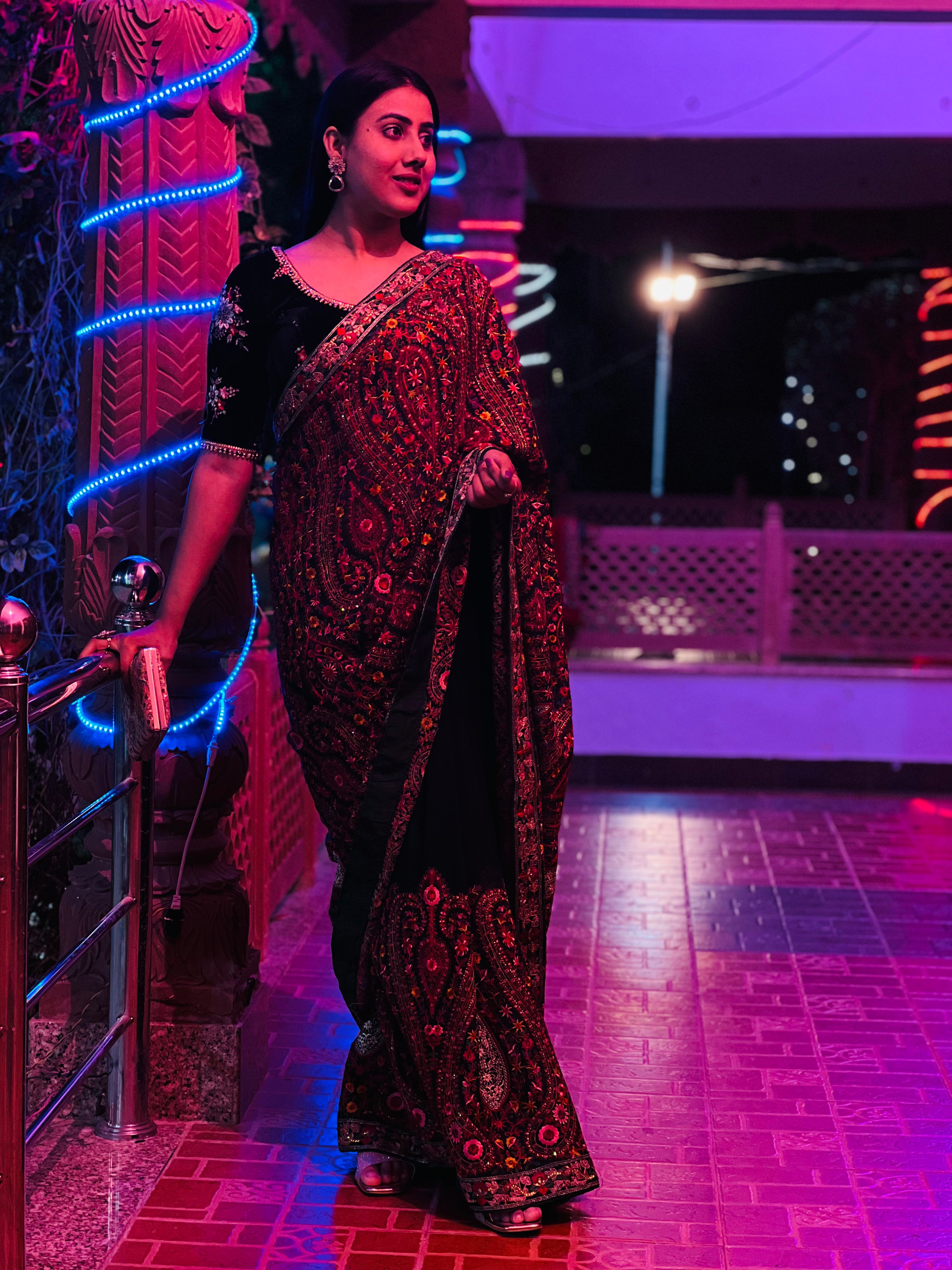 Dark green georgette saree with machine embroidery and running blouse