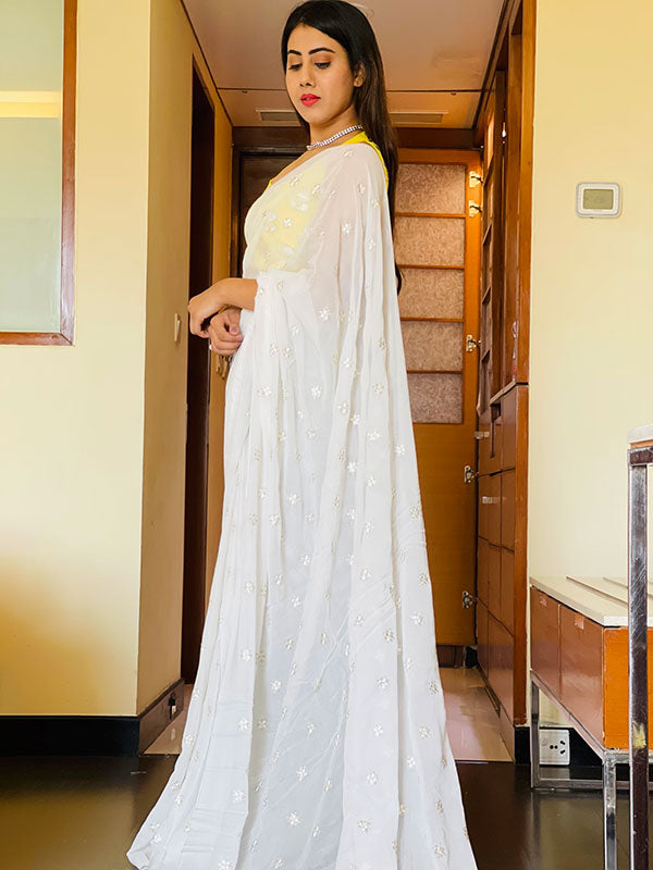 Vega white chiffon saree