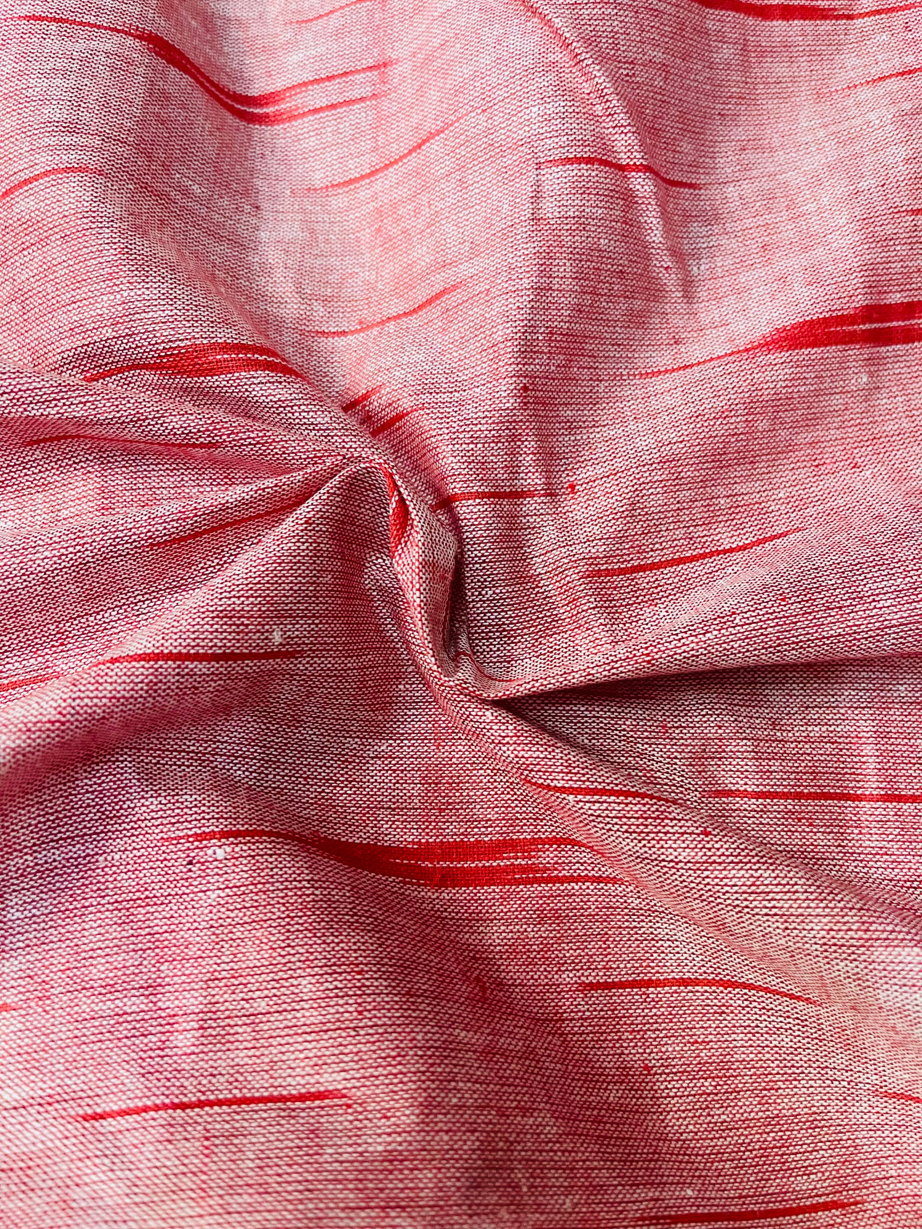 Peachish Red Ikkat blouse fabric